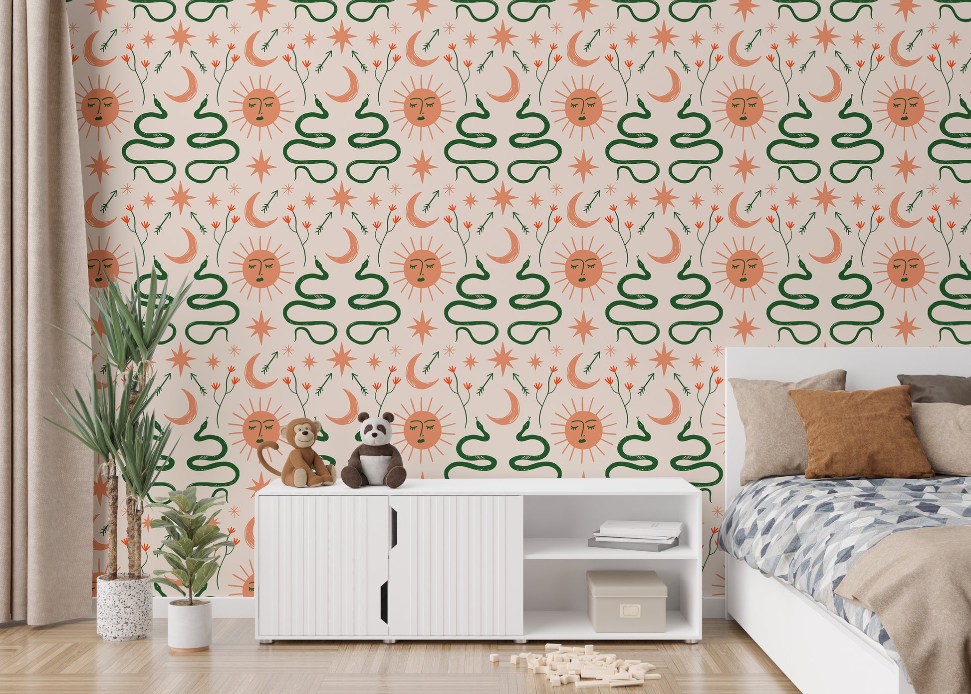 Celestial Boho wallpaper with snakes and sun patterns.