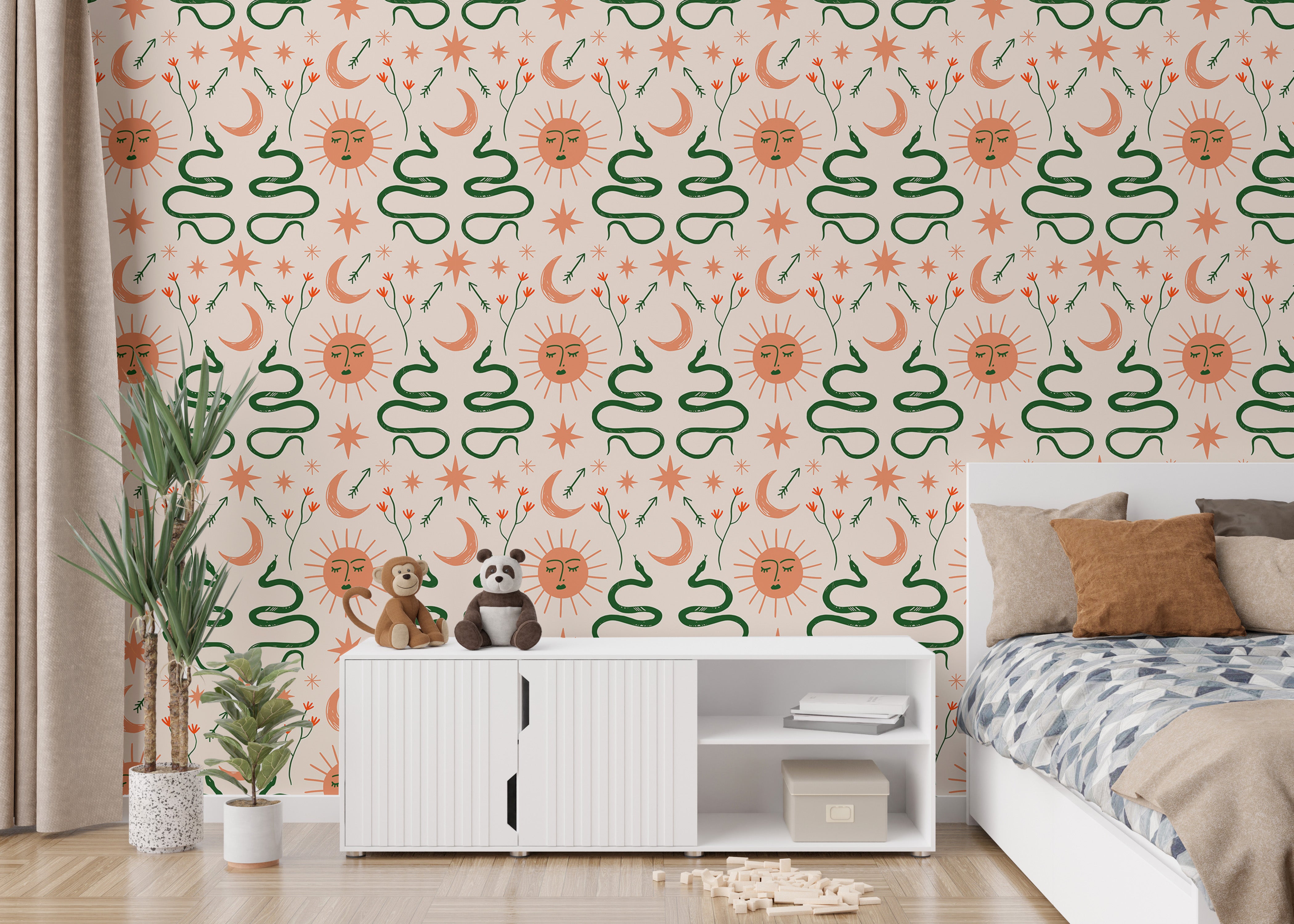 Celestial Boho wallpaper with snakes and sun patterns.