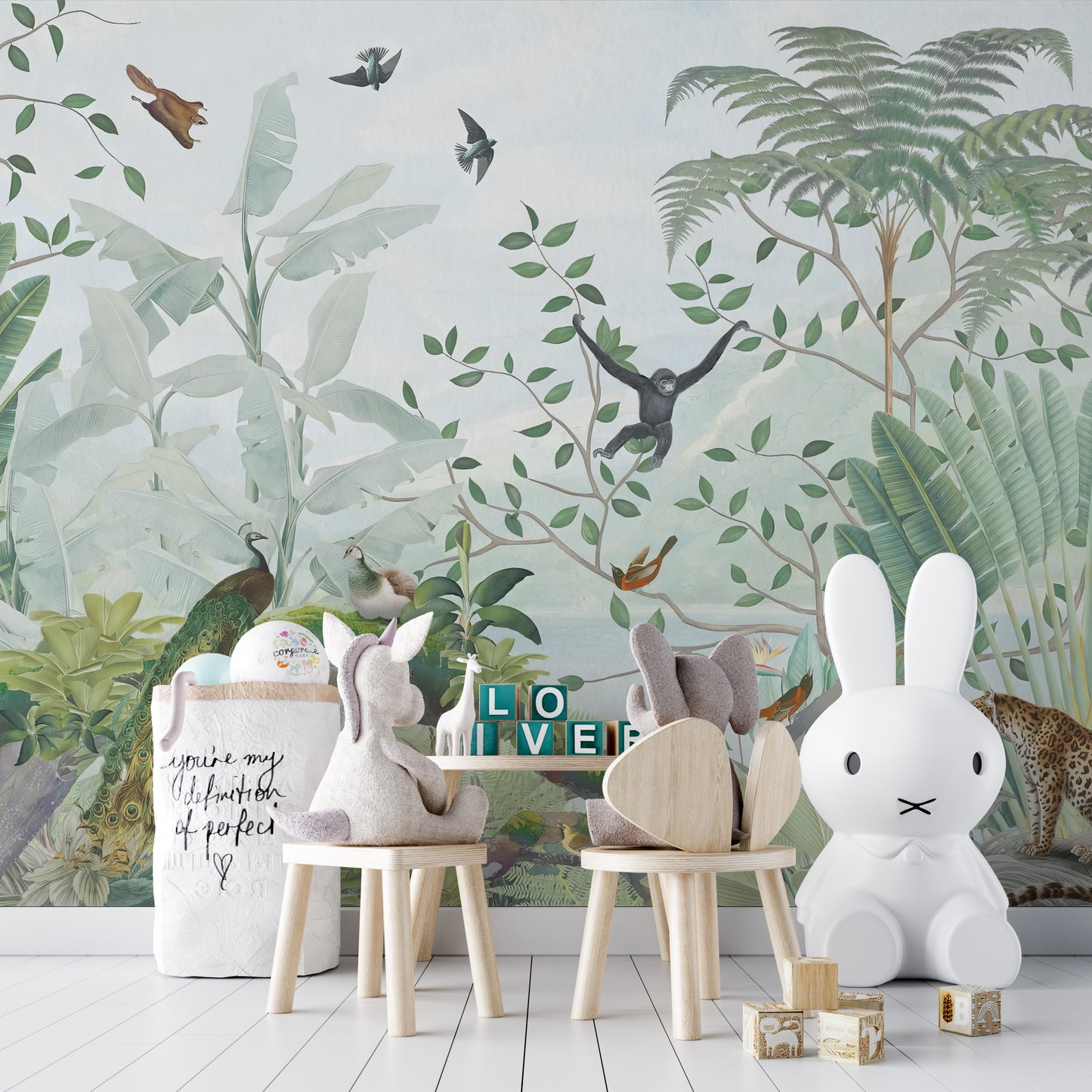 Bright and cheerful jungle wallpaper perfect for a nursery
