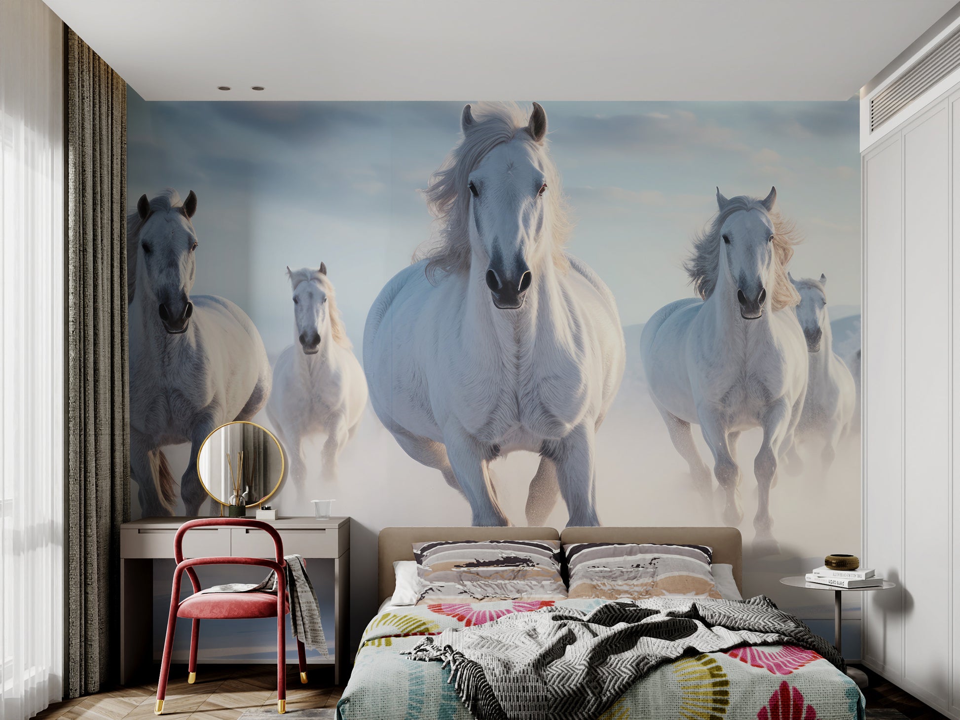 White horses in motion on snowy terrain
