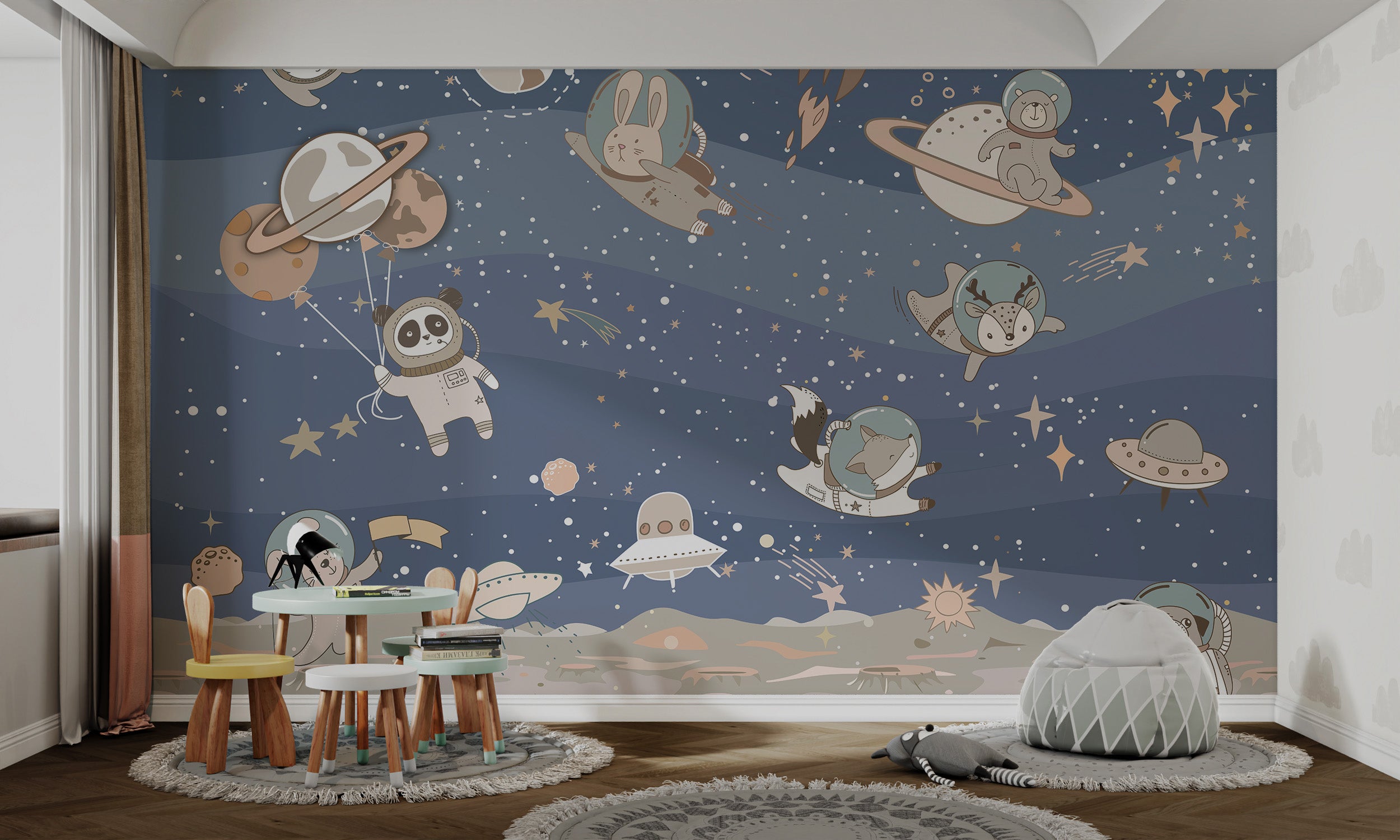 Cute blue mural of space animals floating joyfully