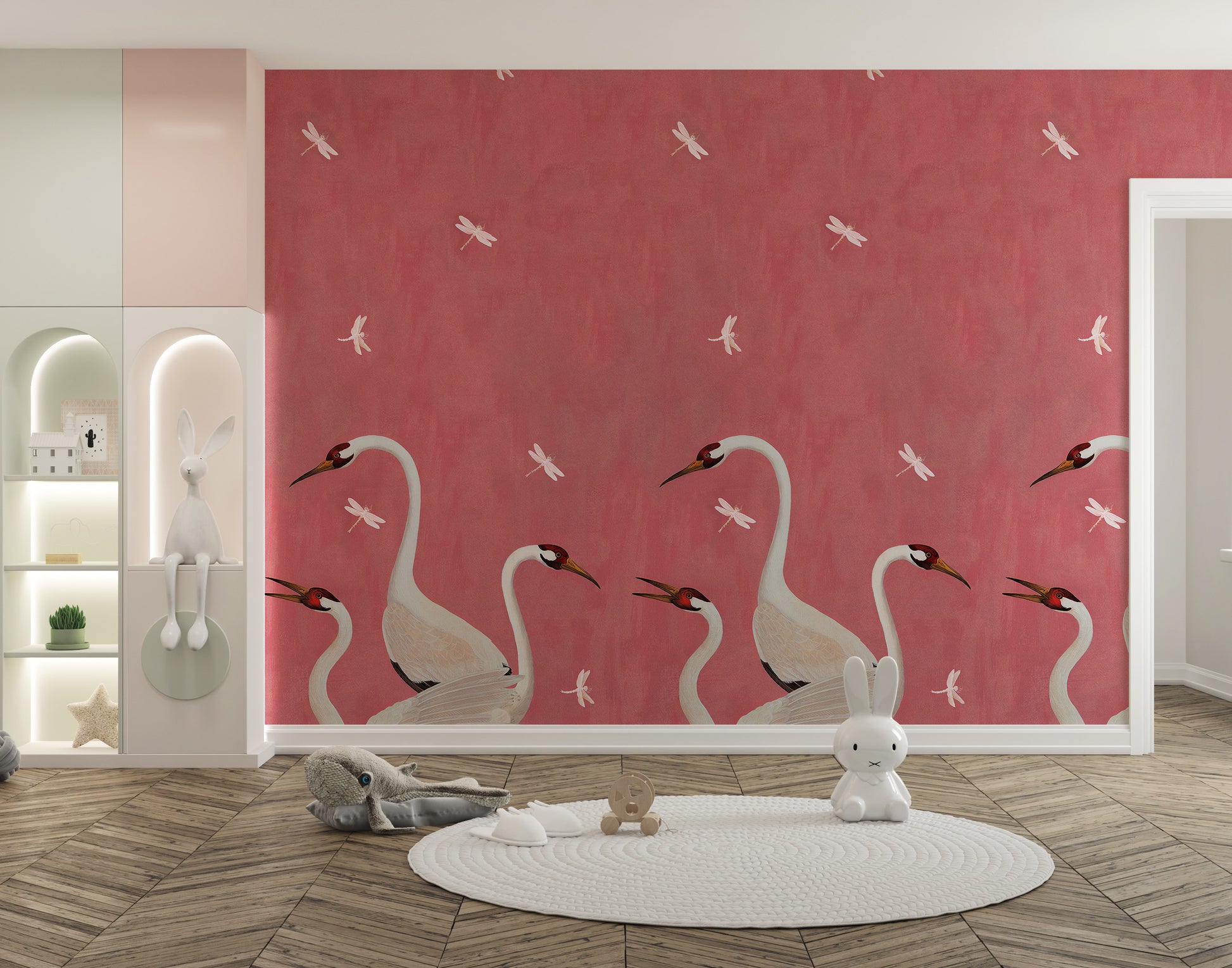 Soft pink mural with soaring cranes design.
