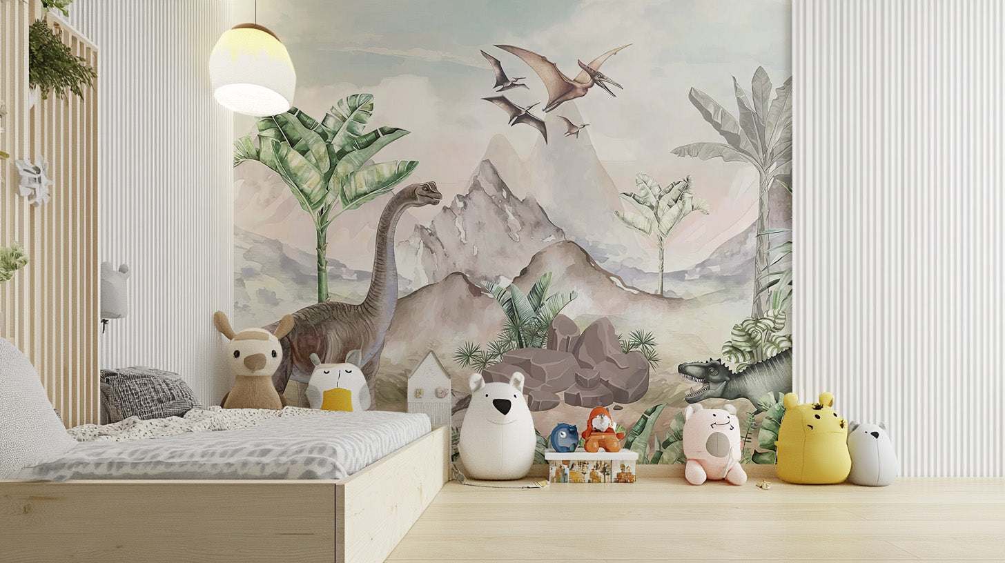 Children’s wall mural with friendly dinosaurs, palm trees, and tropical plants in a peaceful Jurassic-themed mountain setting.