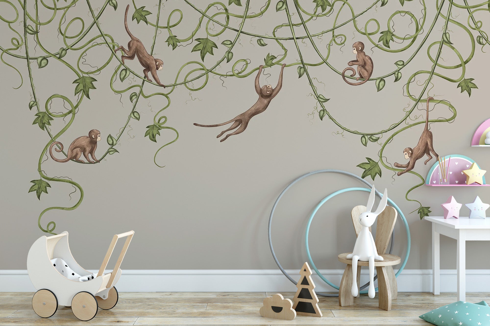 Cute monkey illustrations on a playful nursery wallpaper.
