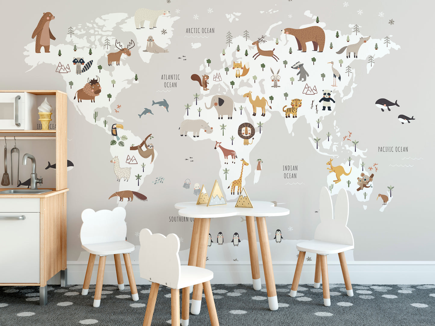 Kids' wallpaper featuring animals on a gray world map
