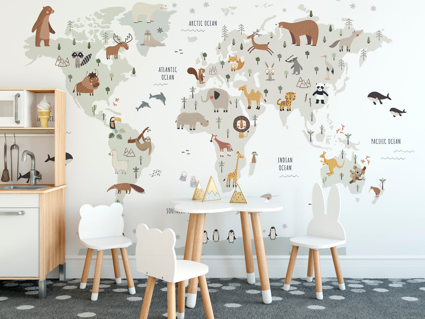 Decorative white world map mural featuring global wildlife
