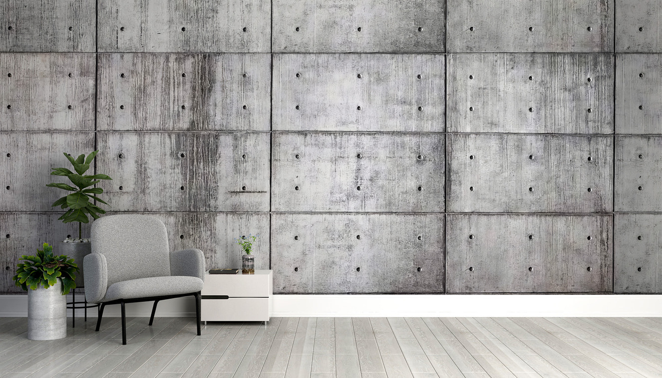 Concrete block wall mural with a textured industrial design
