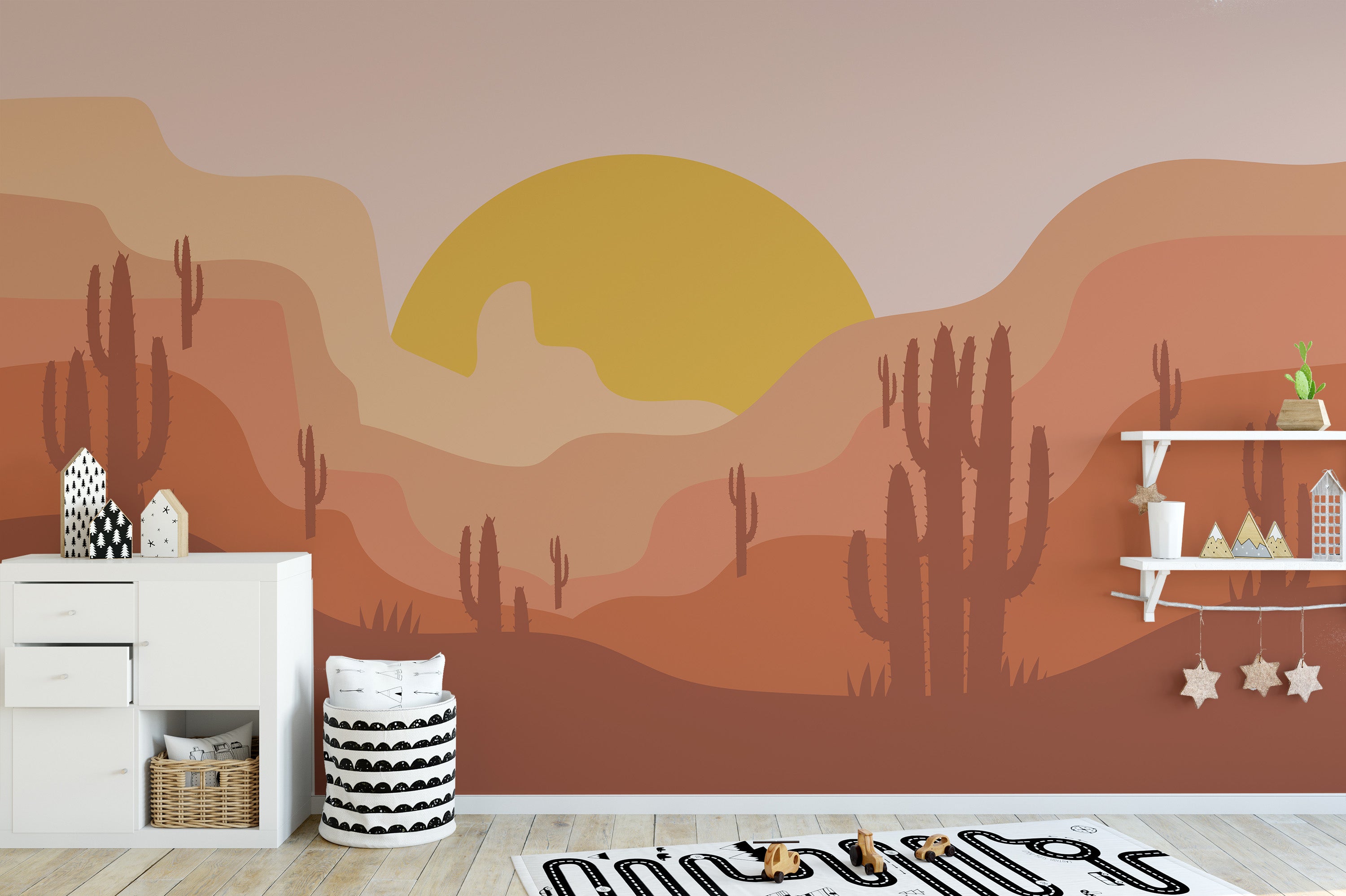 Cactus silhouettes under golden sun on wall mural.