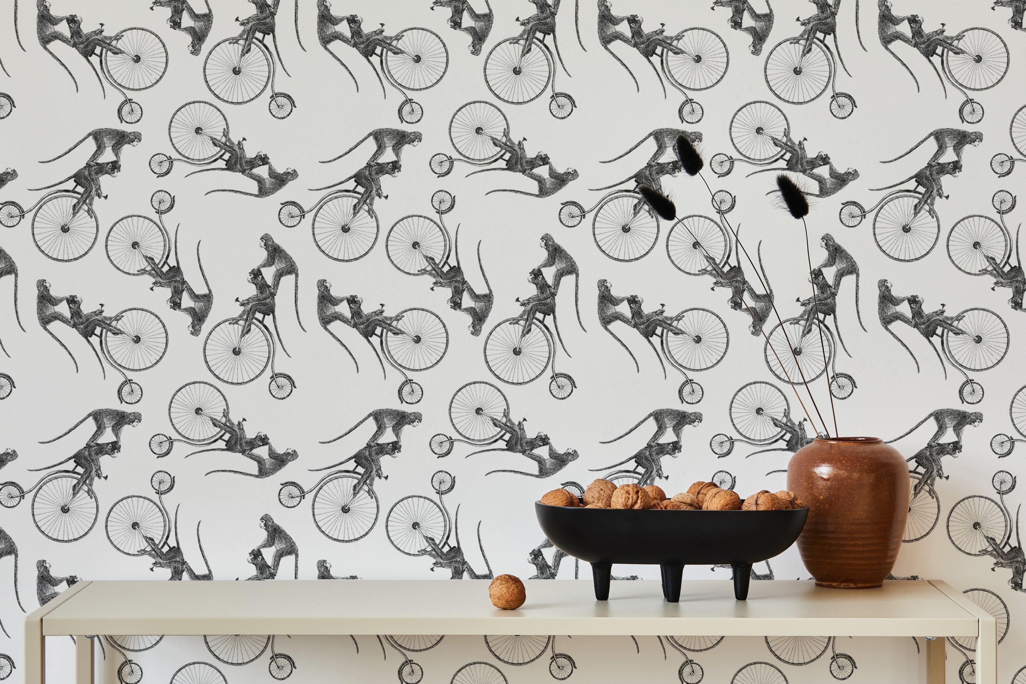 Charming hand-drawn wallpaper with cycling monkeys