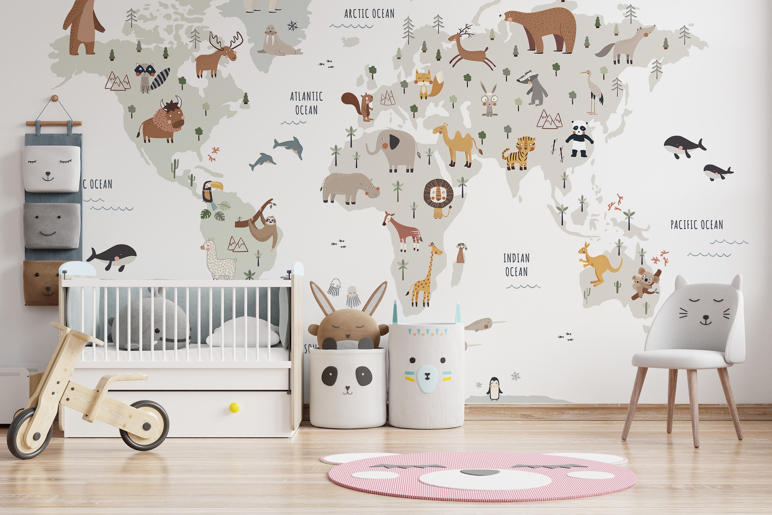 Animal-themed world map mural in soft white hues
