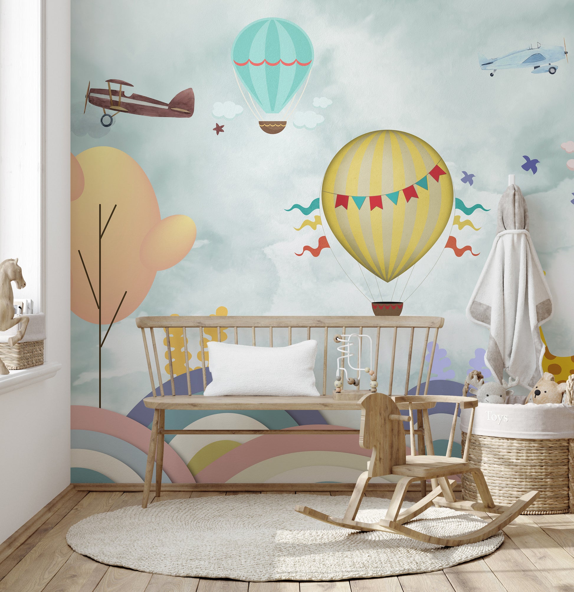 Vibrant balloon-themed cartoon wall mural.
