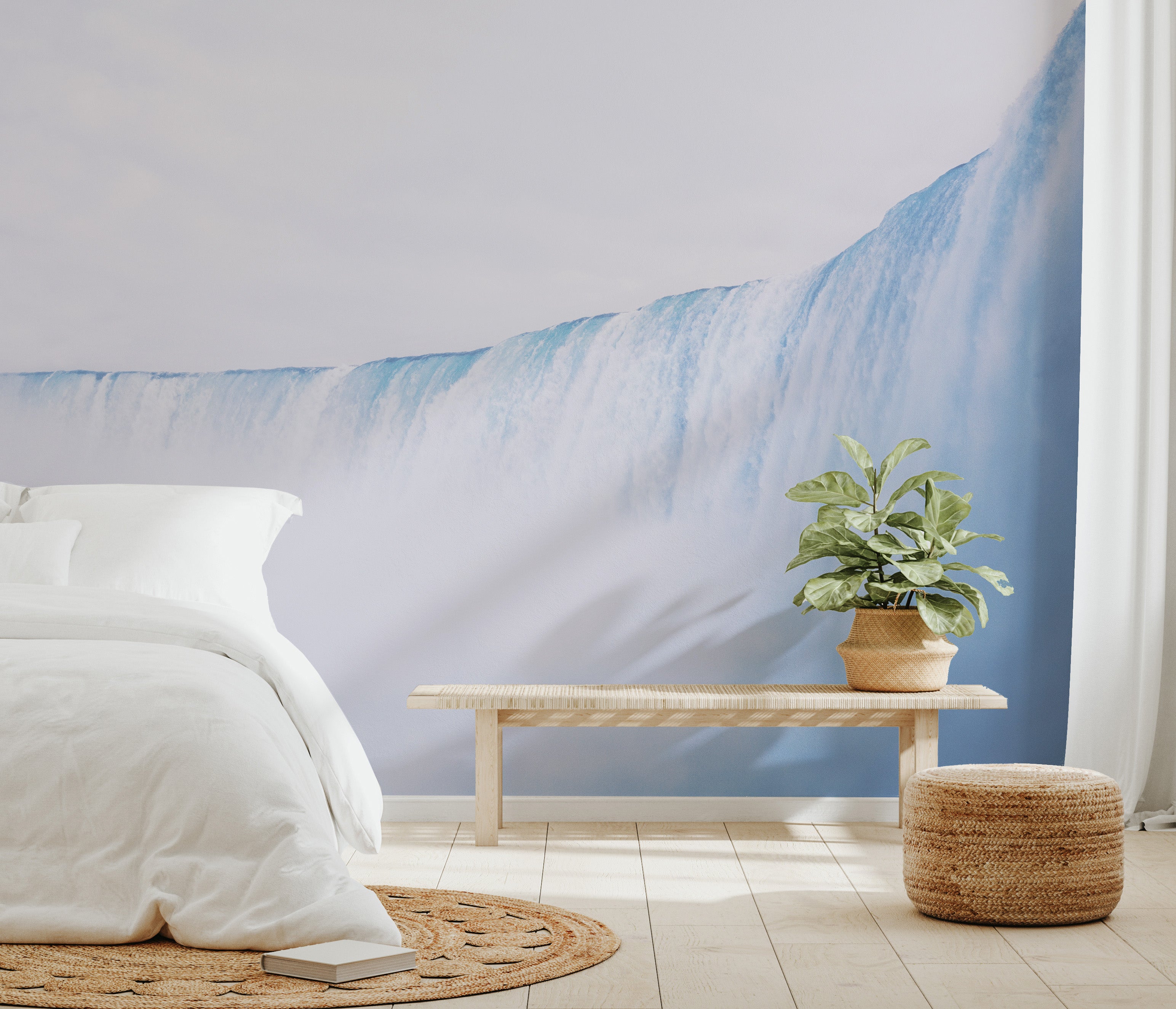 Misty waterfall wall mural with blue water
