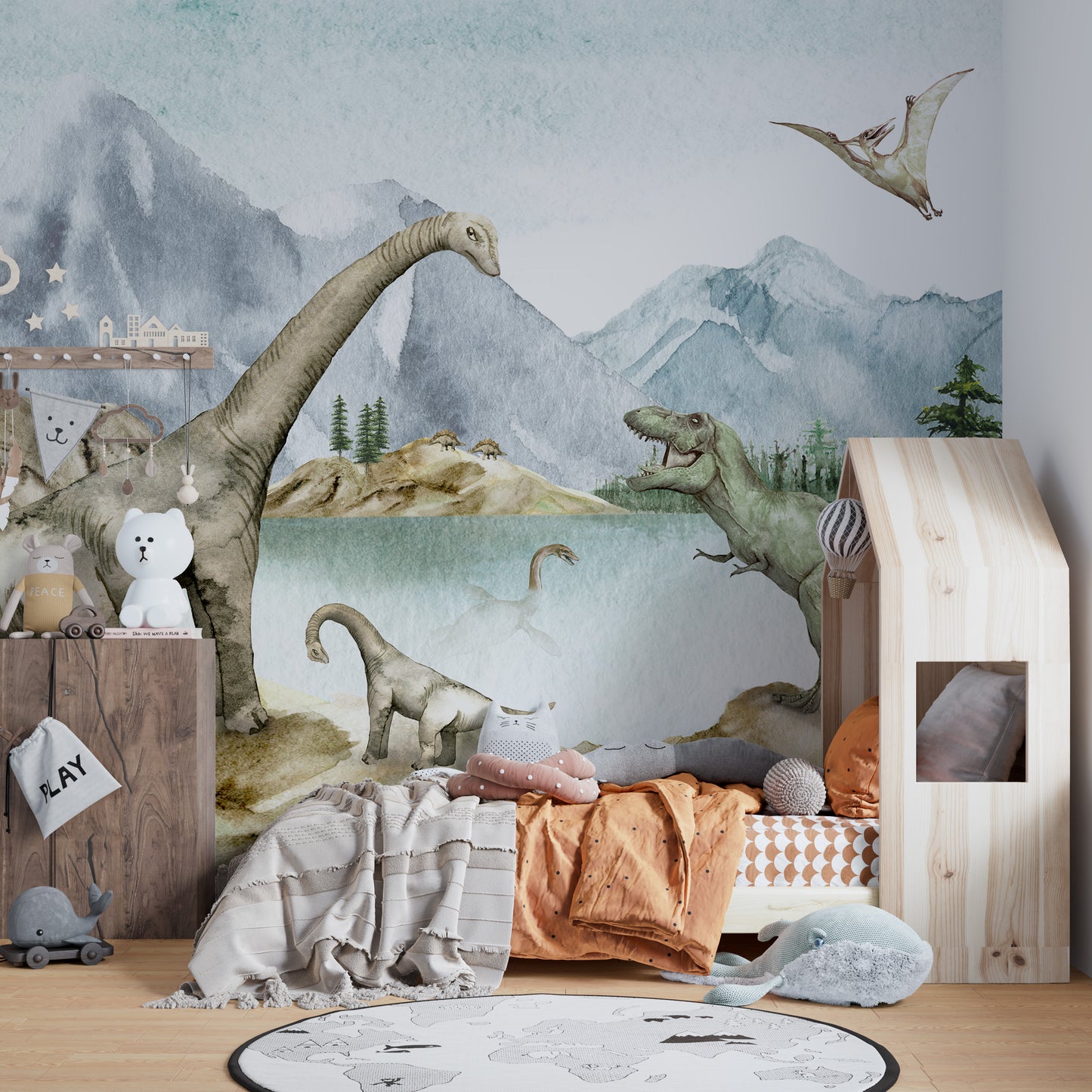 Jurassic-themed mural with dinosaurs by a tranquil lake.
