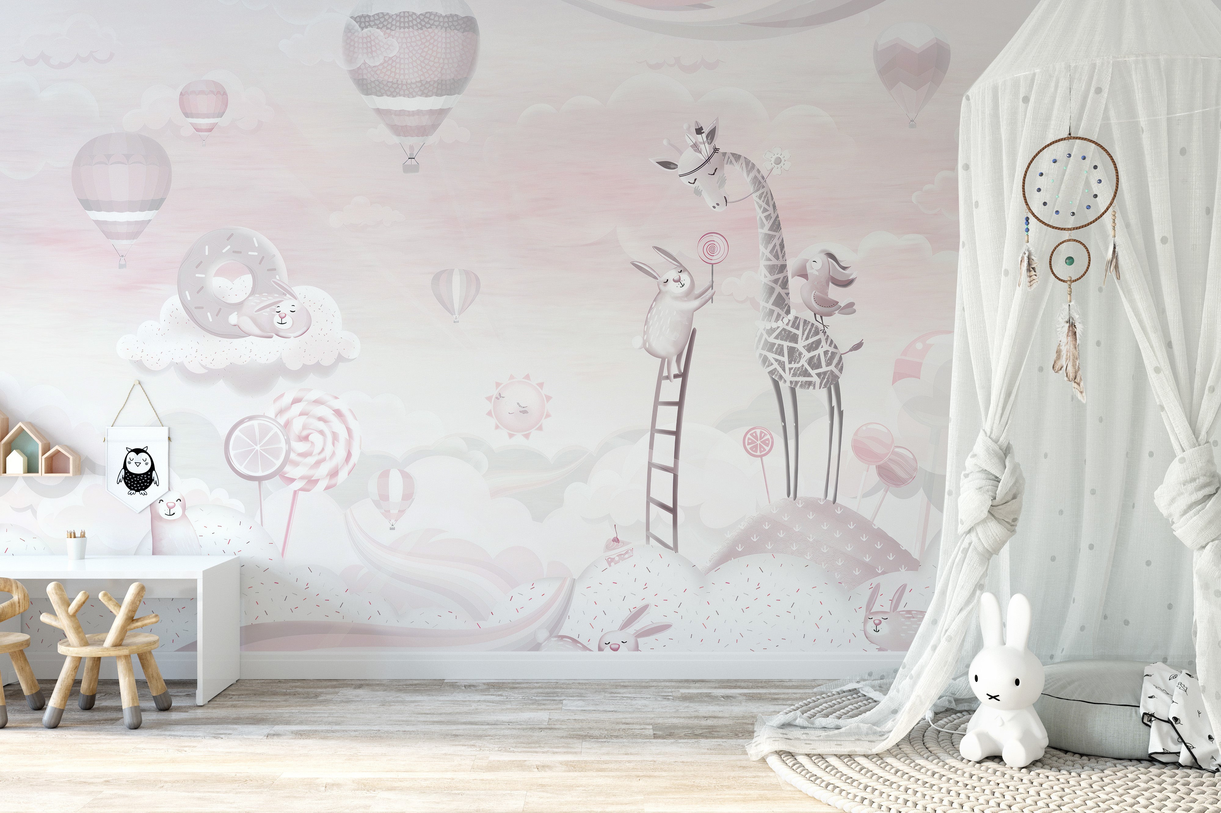 Kids space wallpaper with pink cartoons
