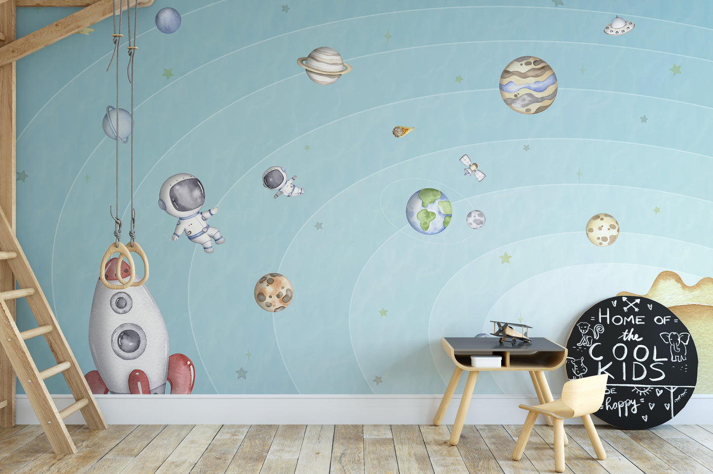 Bright wall mural featuring a light space-themed design
