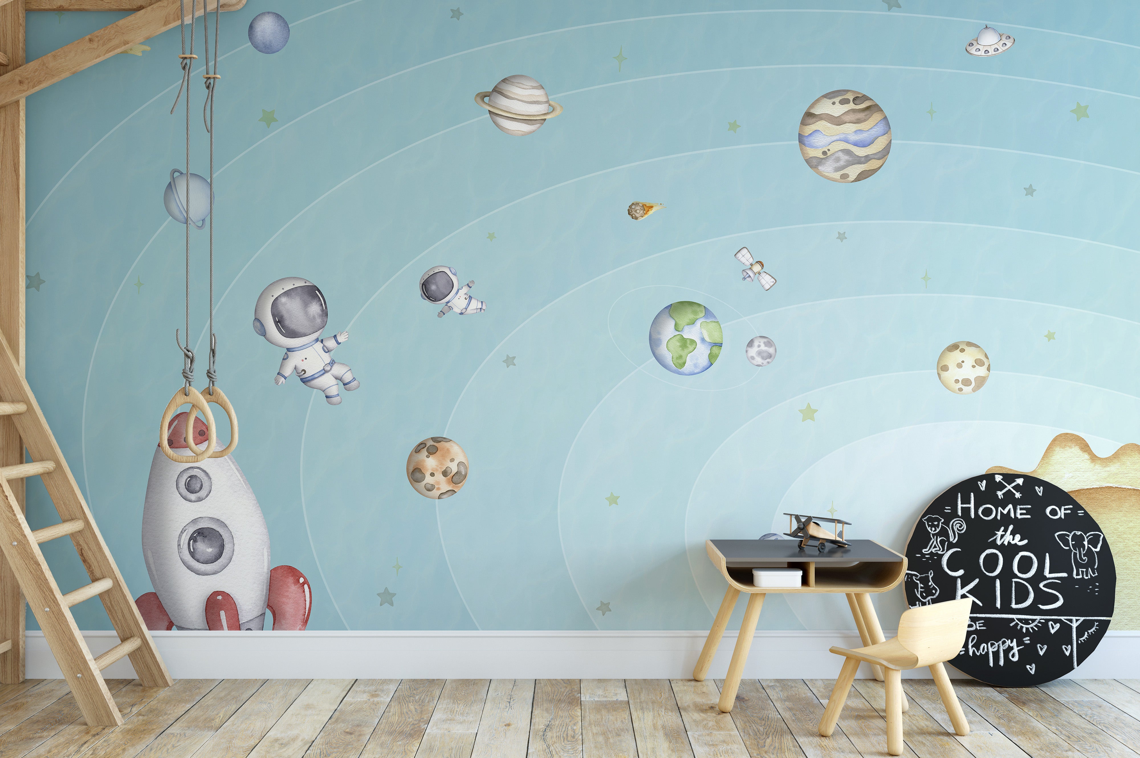 Bright wall mural featuring a light space-themed design
