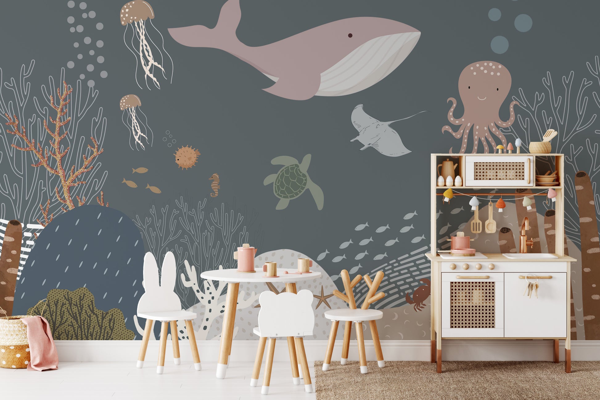 Friendly sea animals swimming in a fun kids' mural.
