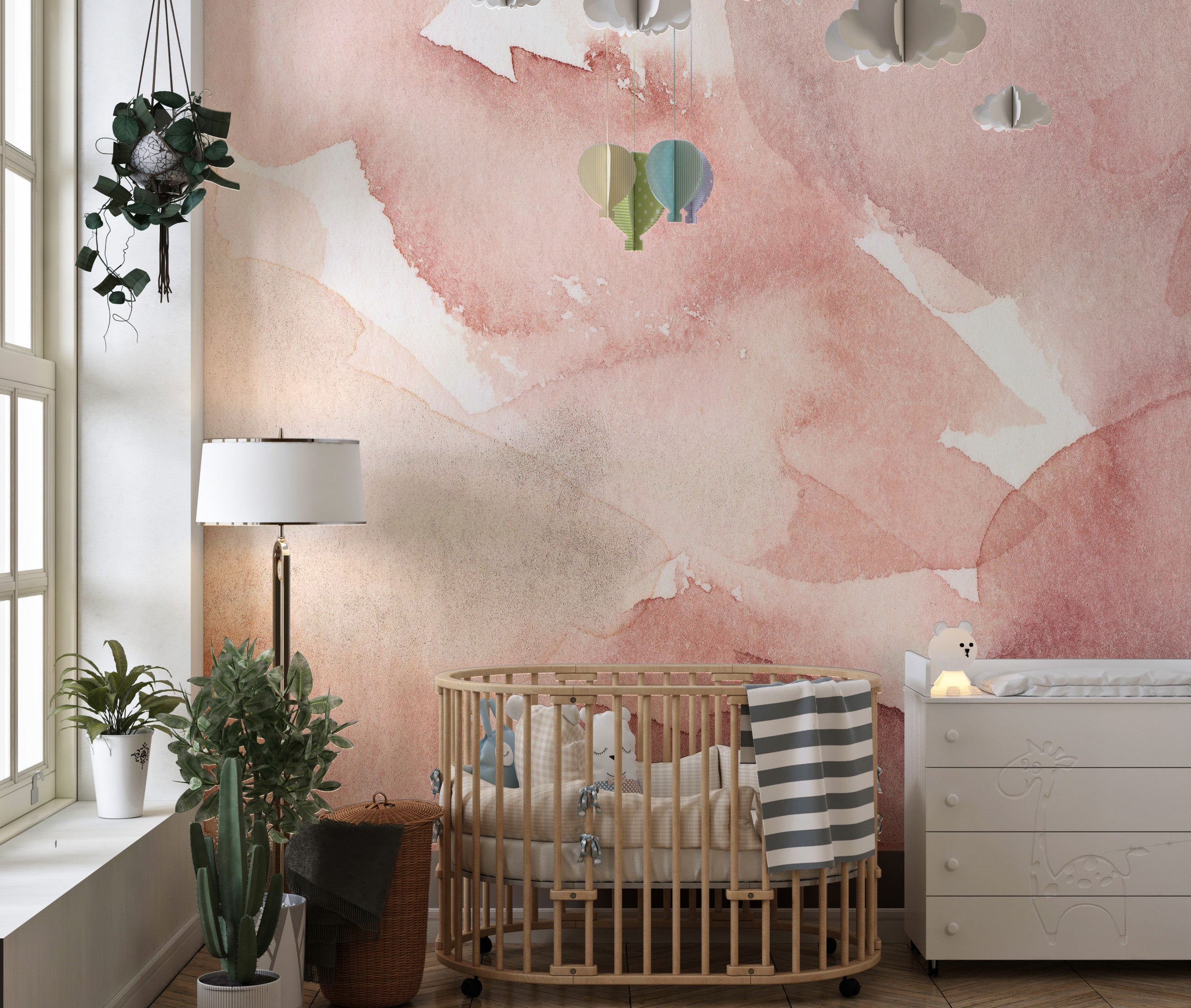 Pink watercolor waves mural adding charm to minimalist spaces.
