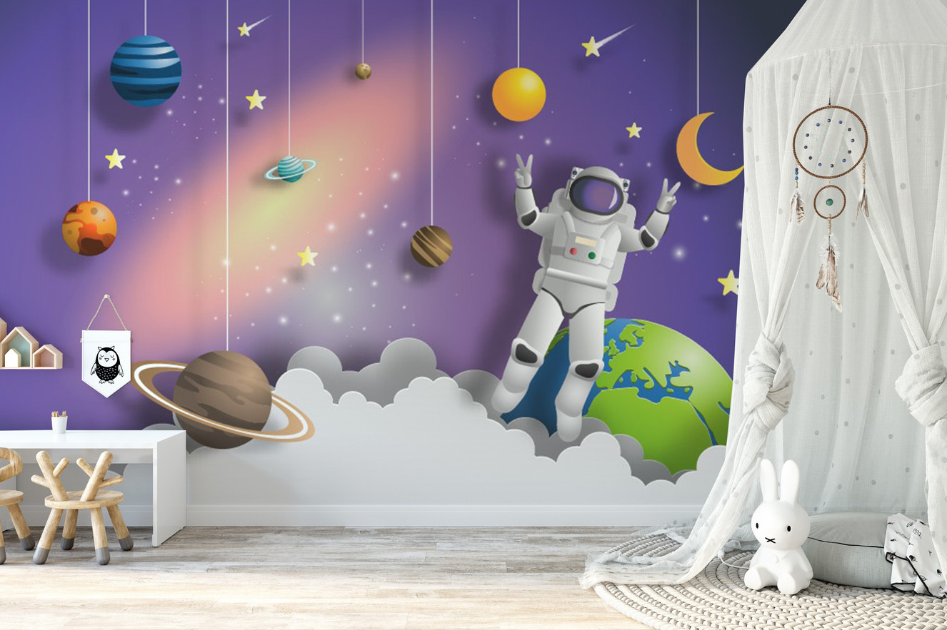 Astronaut mural with stars, planets, and galaxies for kids' rooms.
