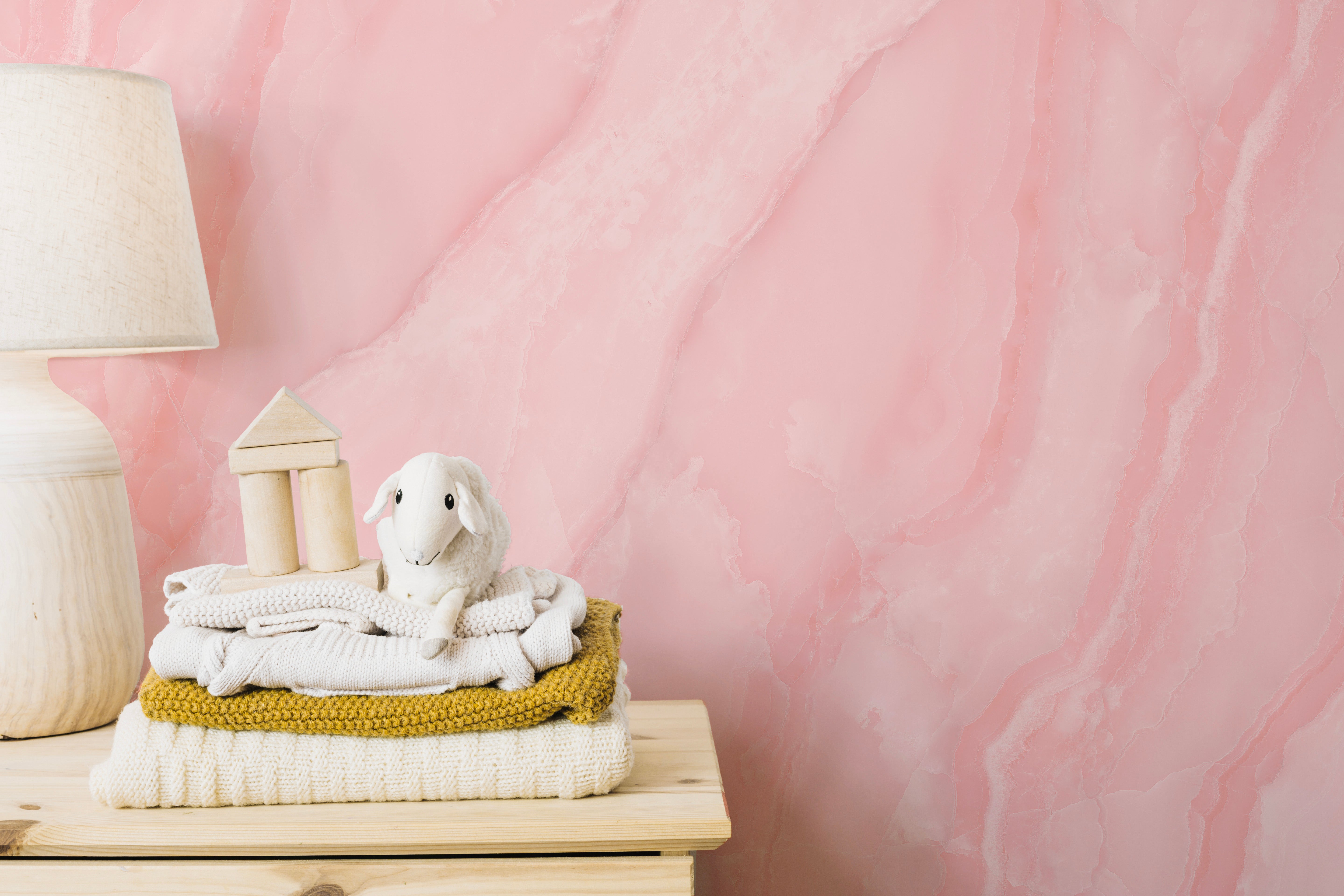 Soft pink marble wallpaper mural for stylish and serene spaces.
