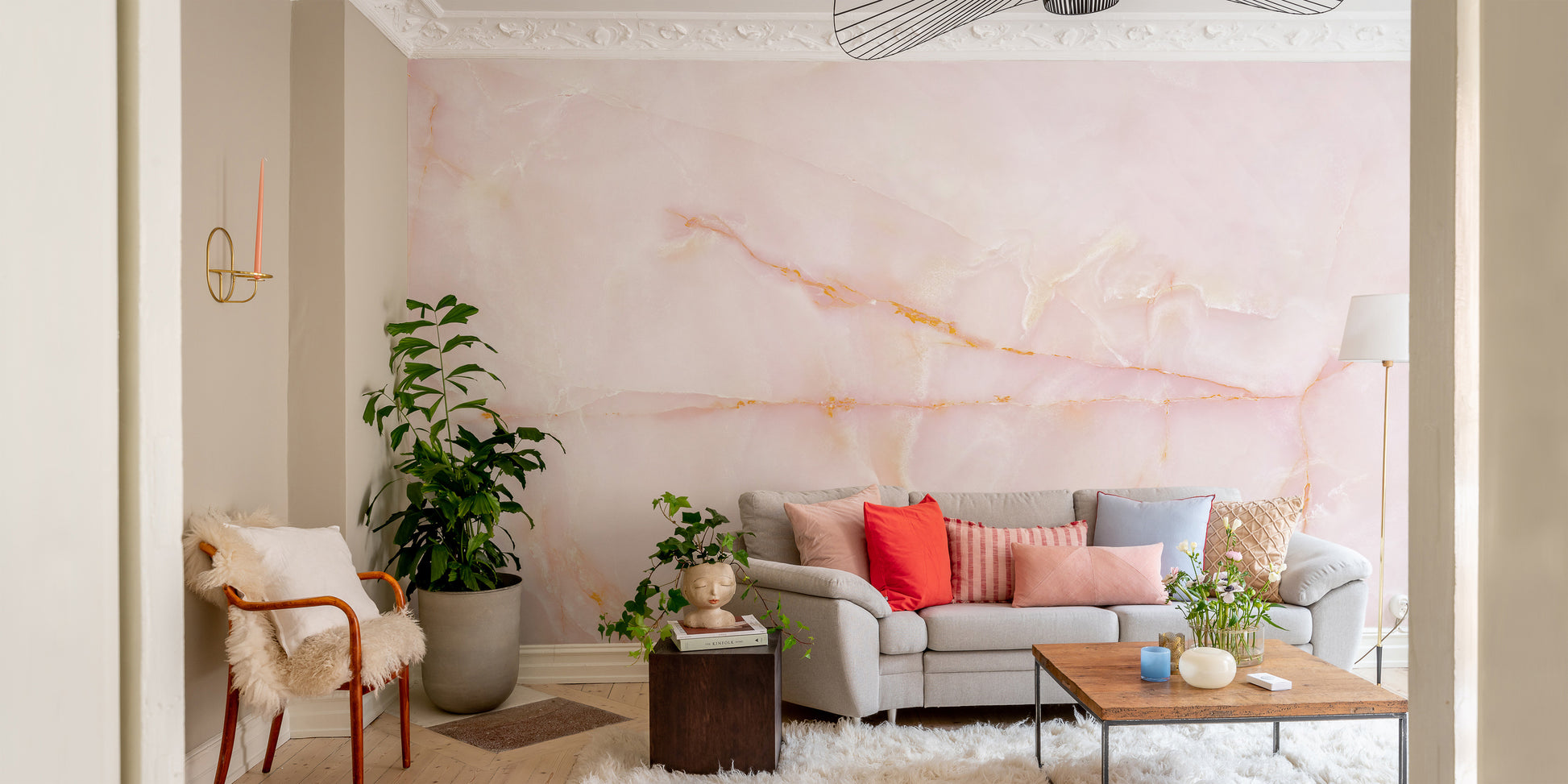 Blushing pink marble mural adding warmth and sophistication to walls.
