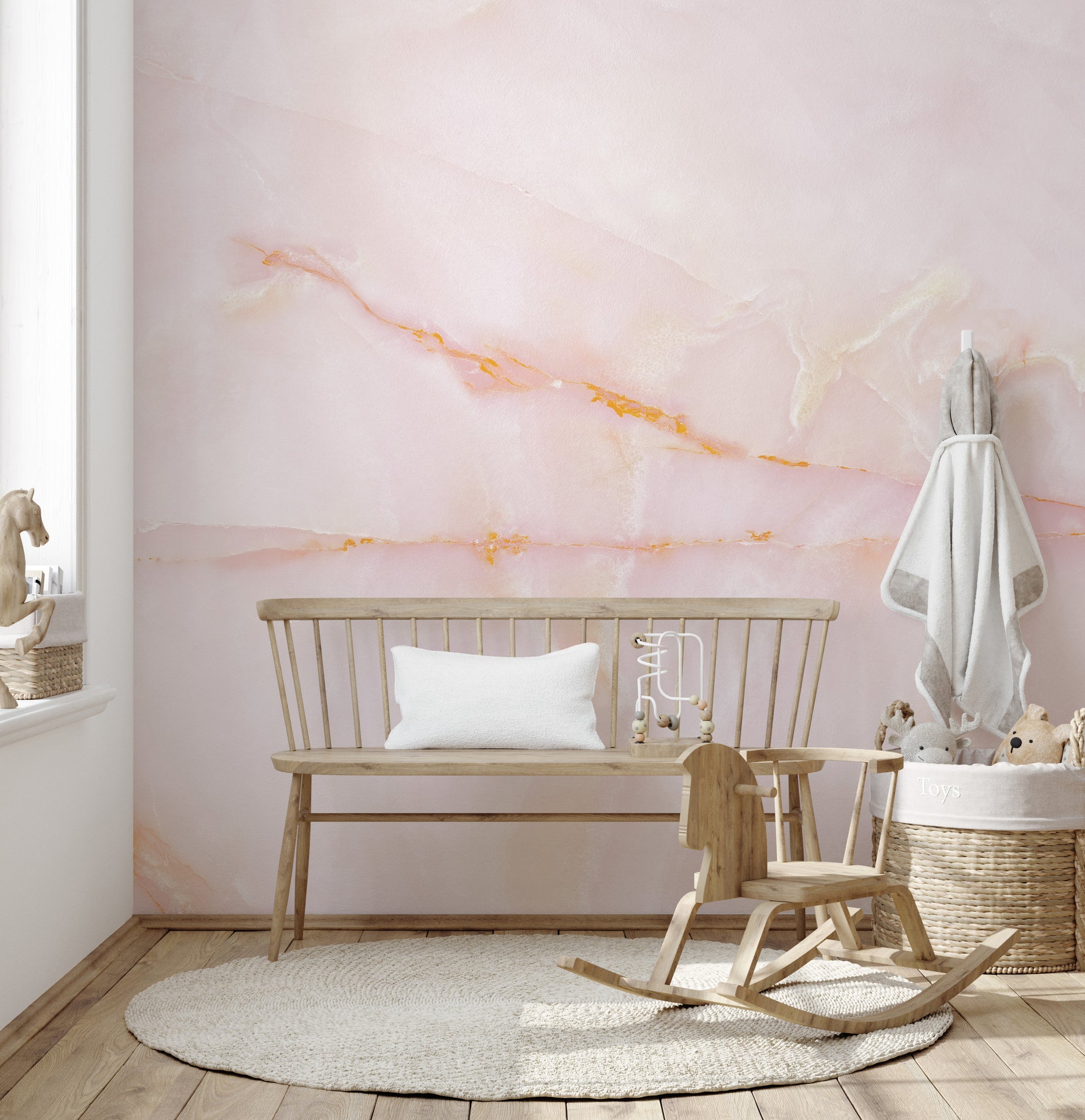 Artistic mural featuring blushing pink onyx marble textures.
