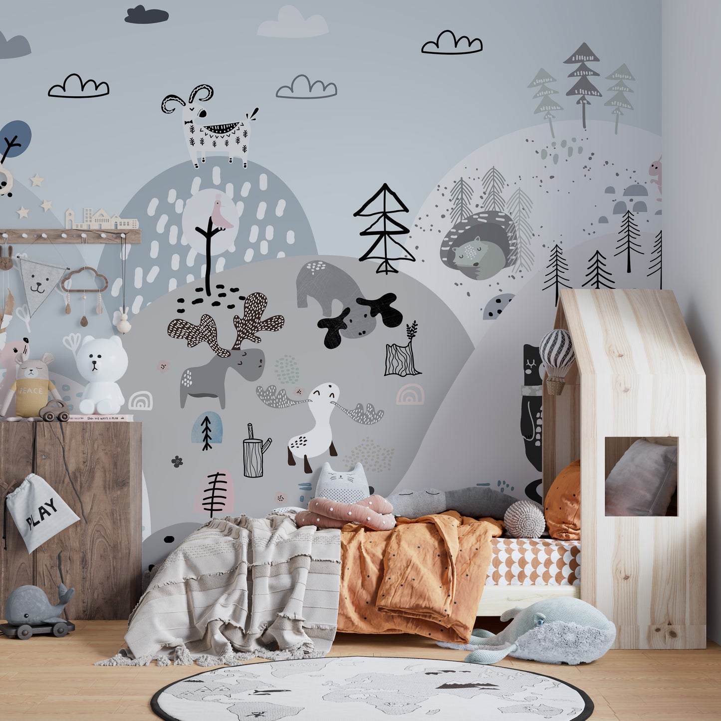 Playful hillside mural featuring colorful cartoon creatures.
