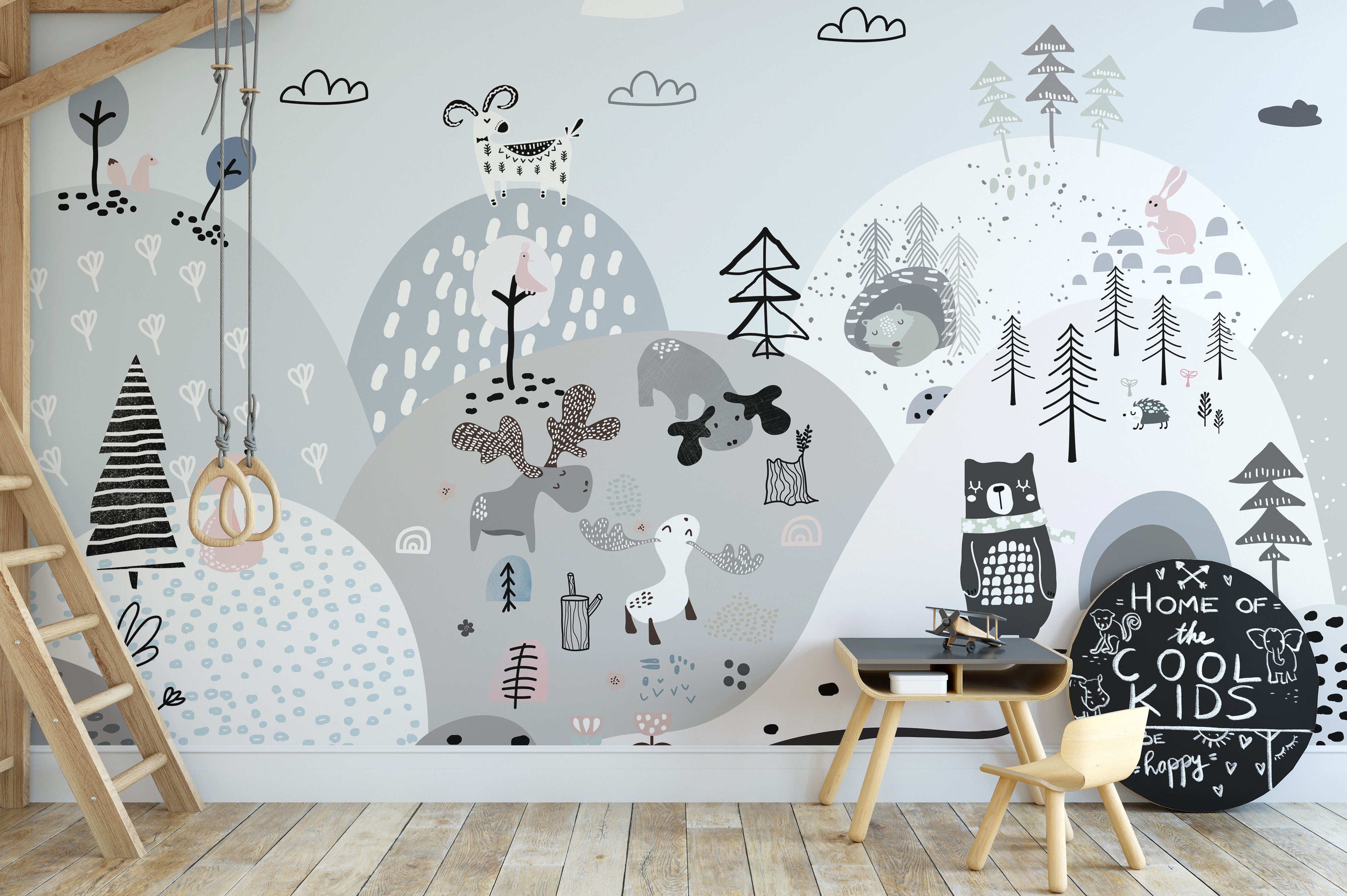 Artistic mural with cartoon creatures on a lively hillside.
