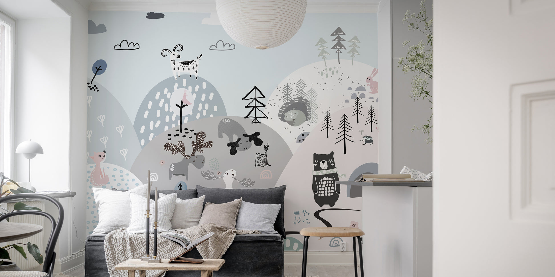 Cartoon creatures on a hillside mural for cheerful wall spaces.
