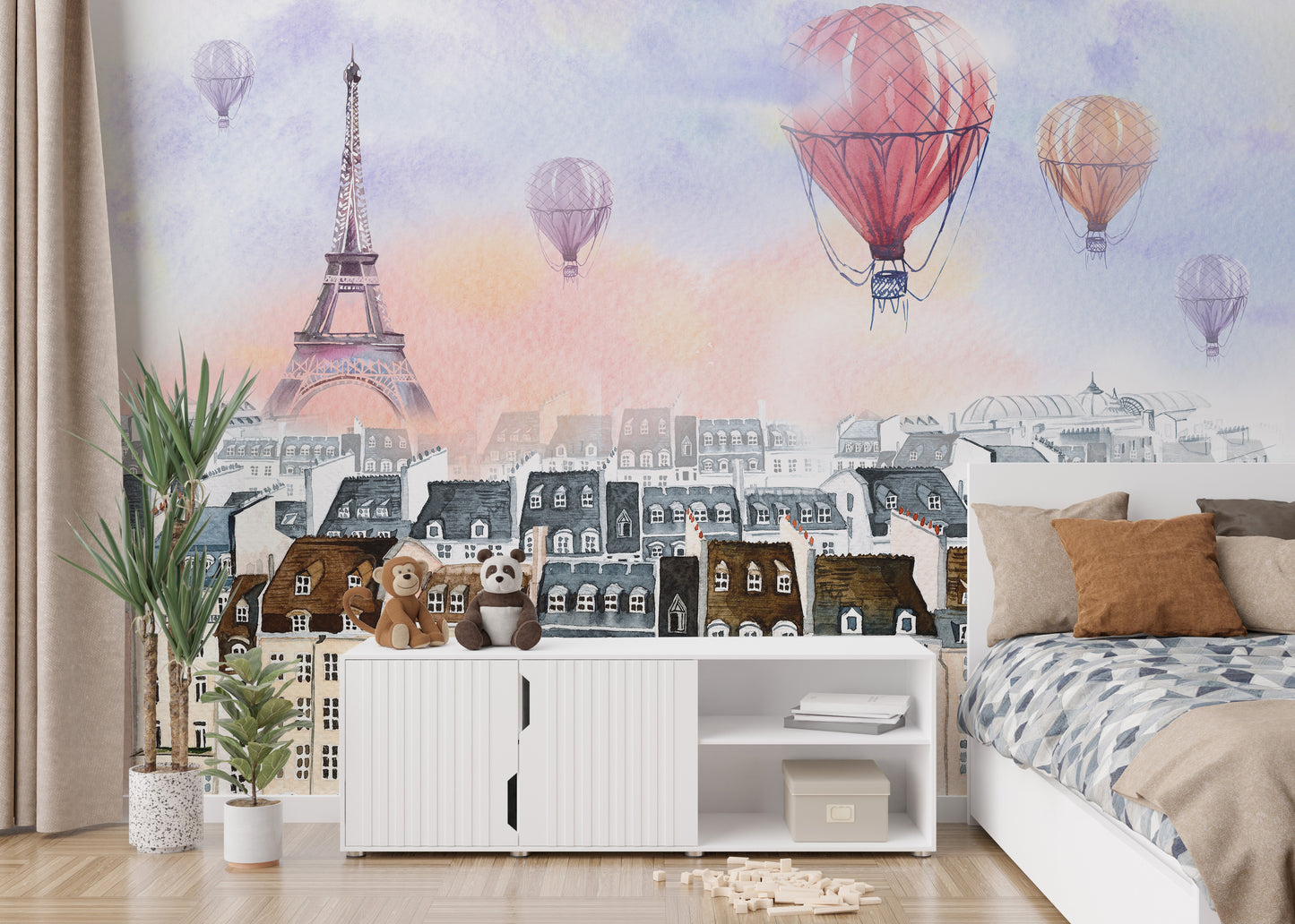 Artistic mural of a hot air balloon above Paris in watercolor tones.
