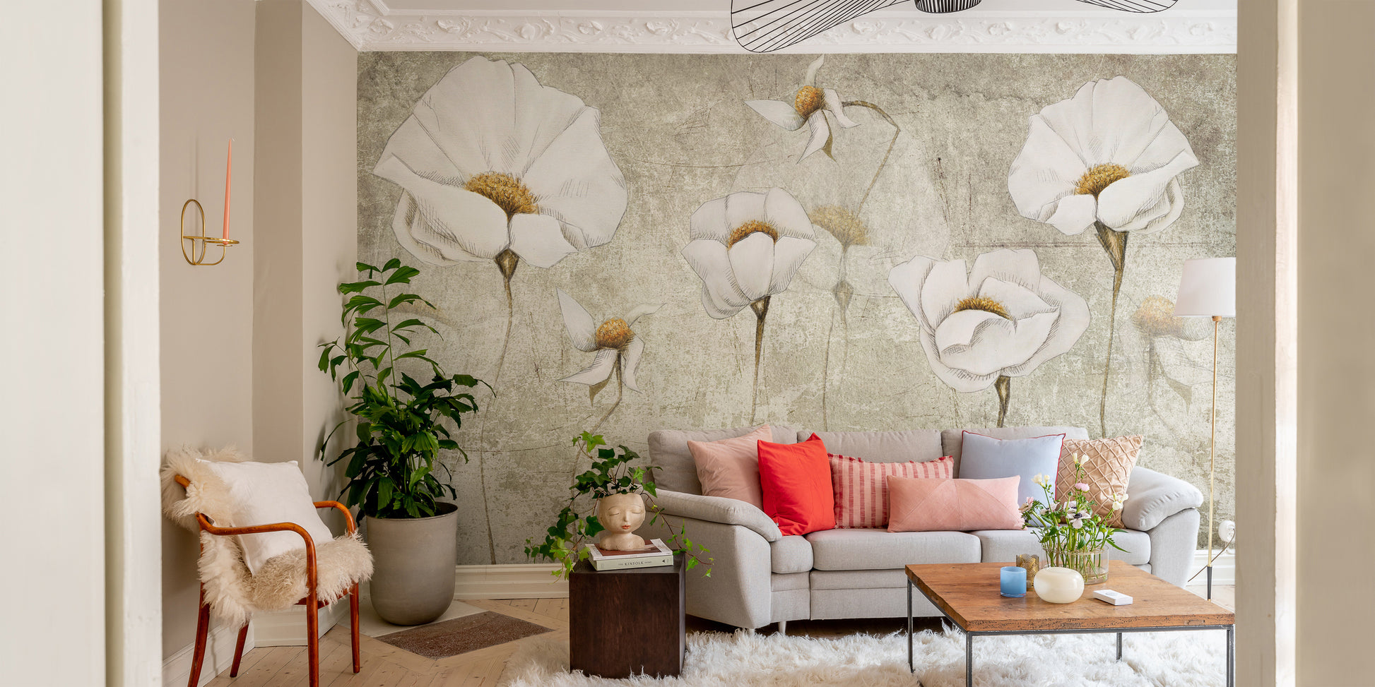 Worn white blossom mural creating a tranquil oasis ambiance.
