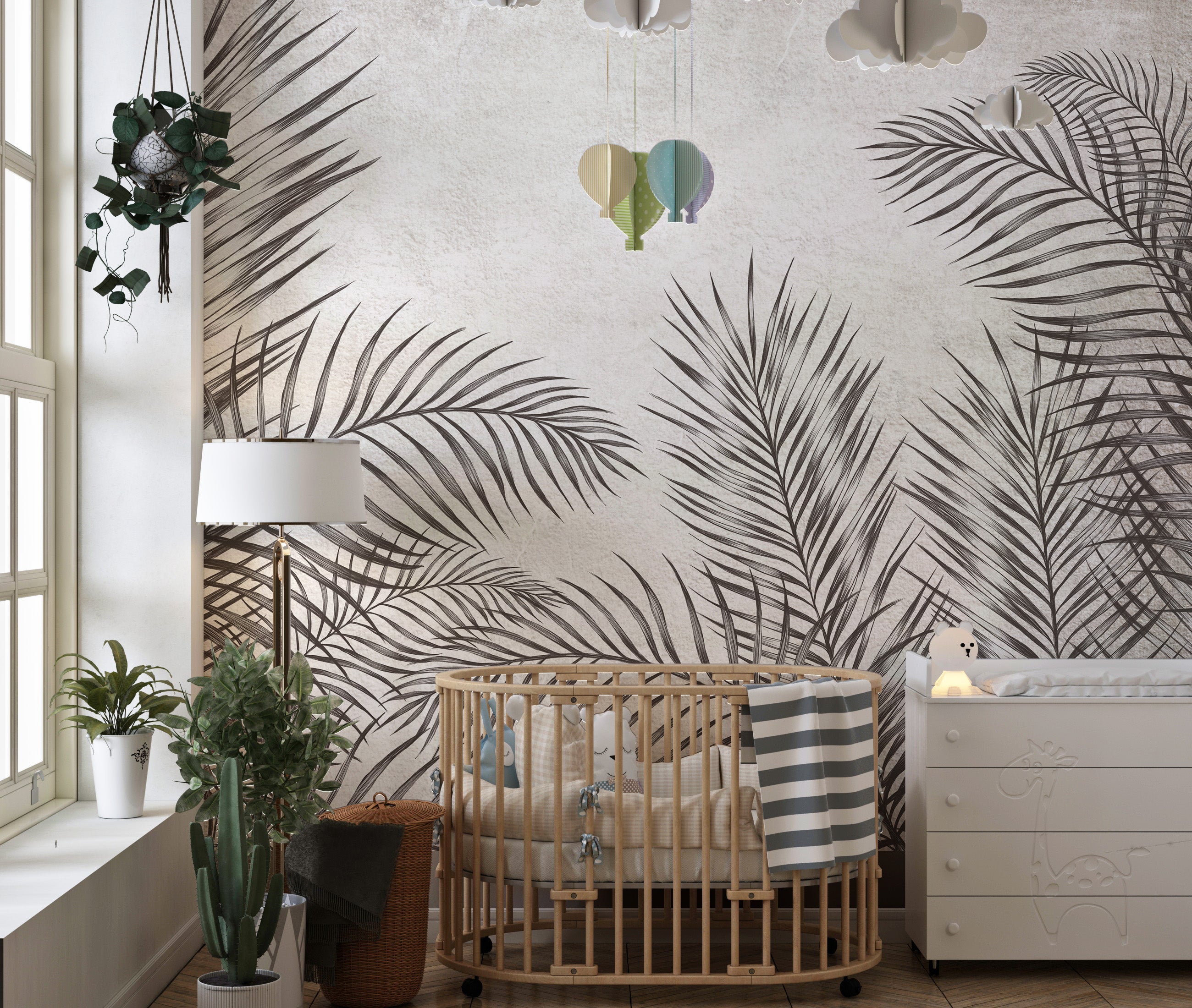 Palm leaves wallpaper mural in black and white for chic decor.
