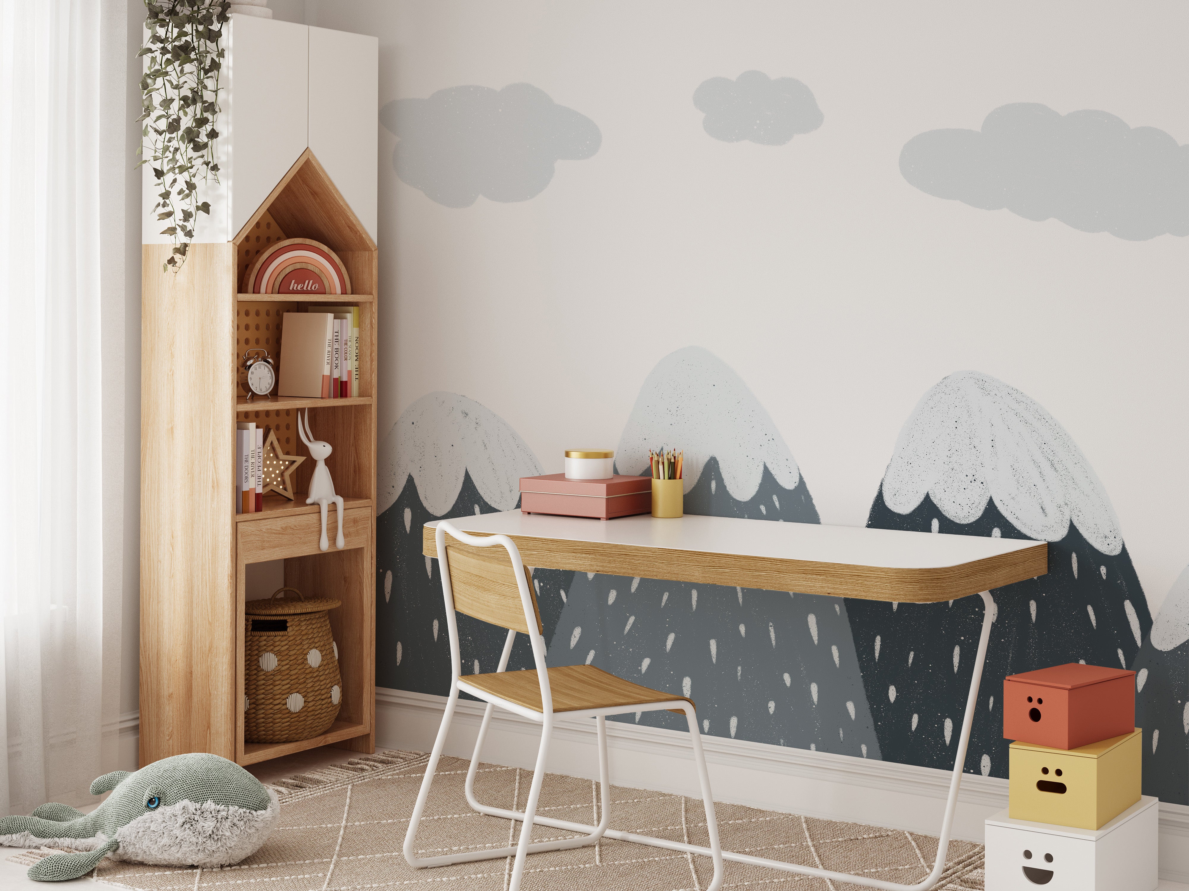 Snowy mountains mural creating a calm vibe for kids' spaces.
