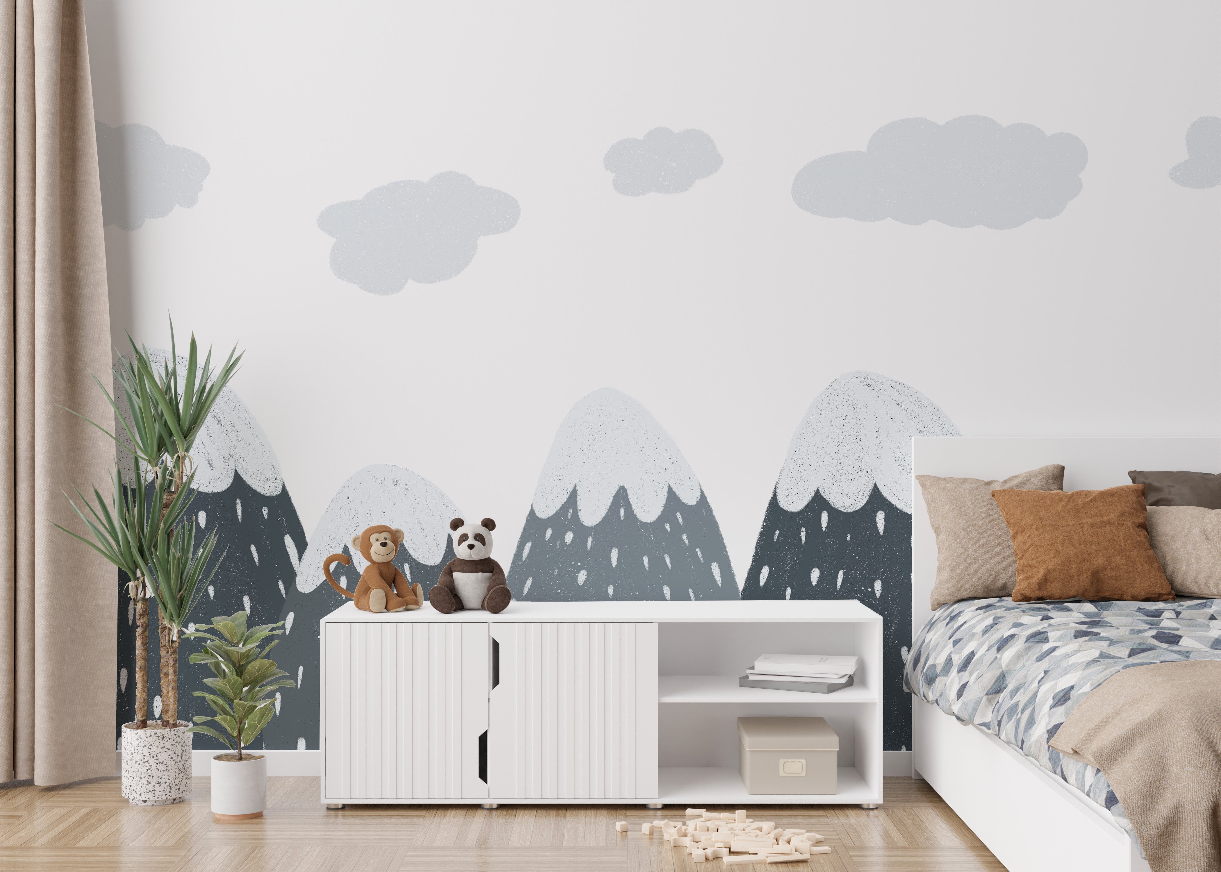 Kids' room mural with snow-capped mountains and soft landscapes.
