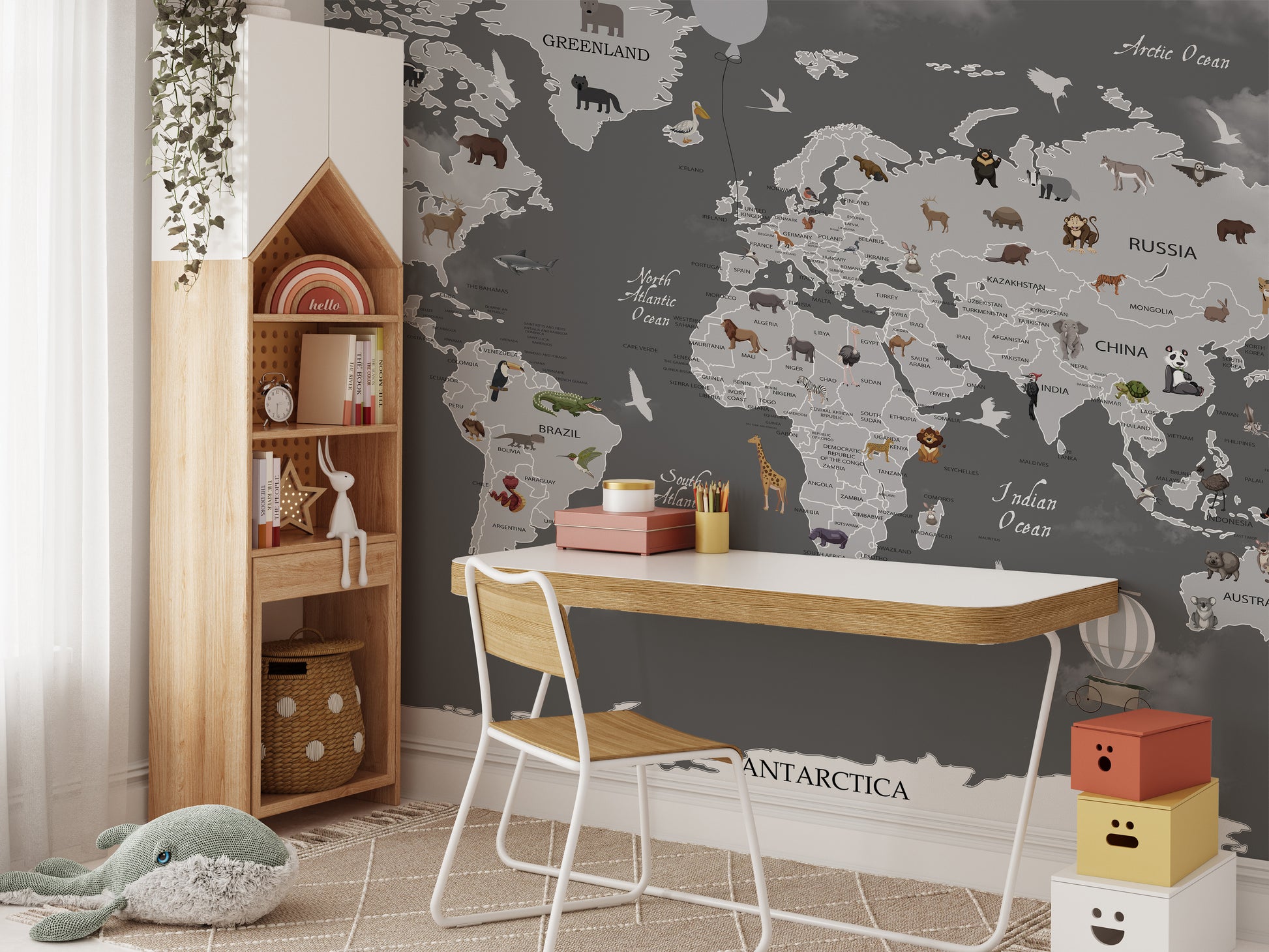 World map mural with animals for fun and interactive interiors.
