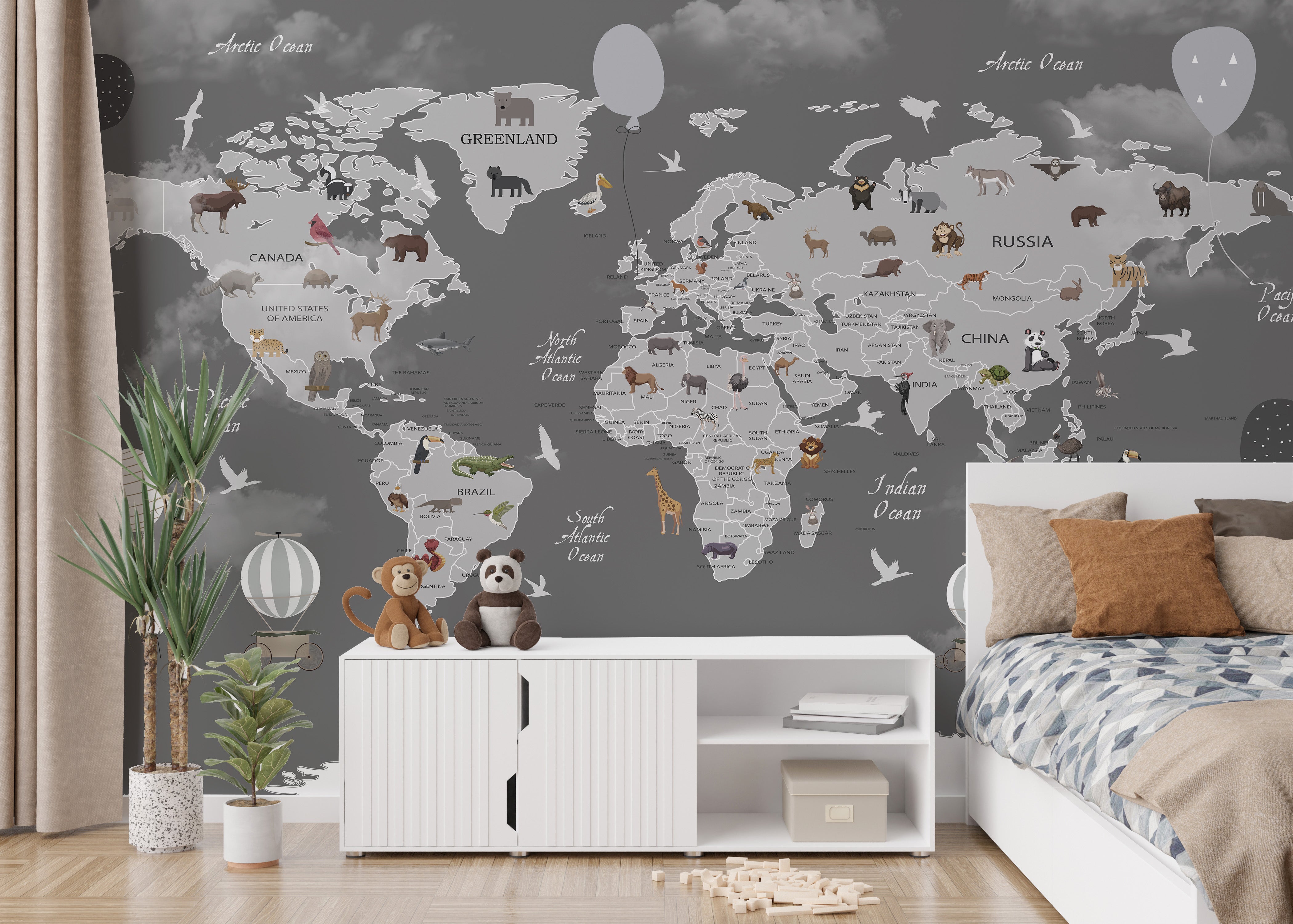 Kids' mural showcasing animals across a world map design.
