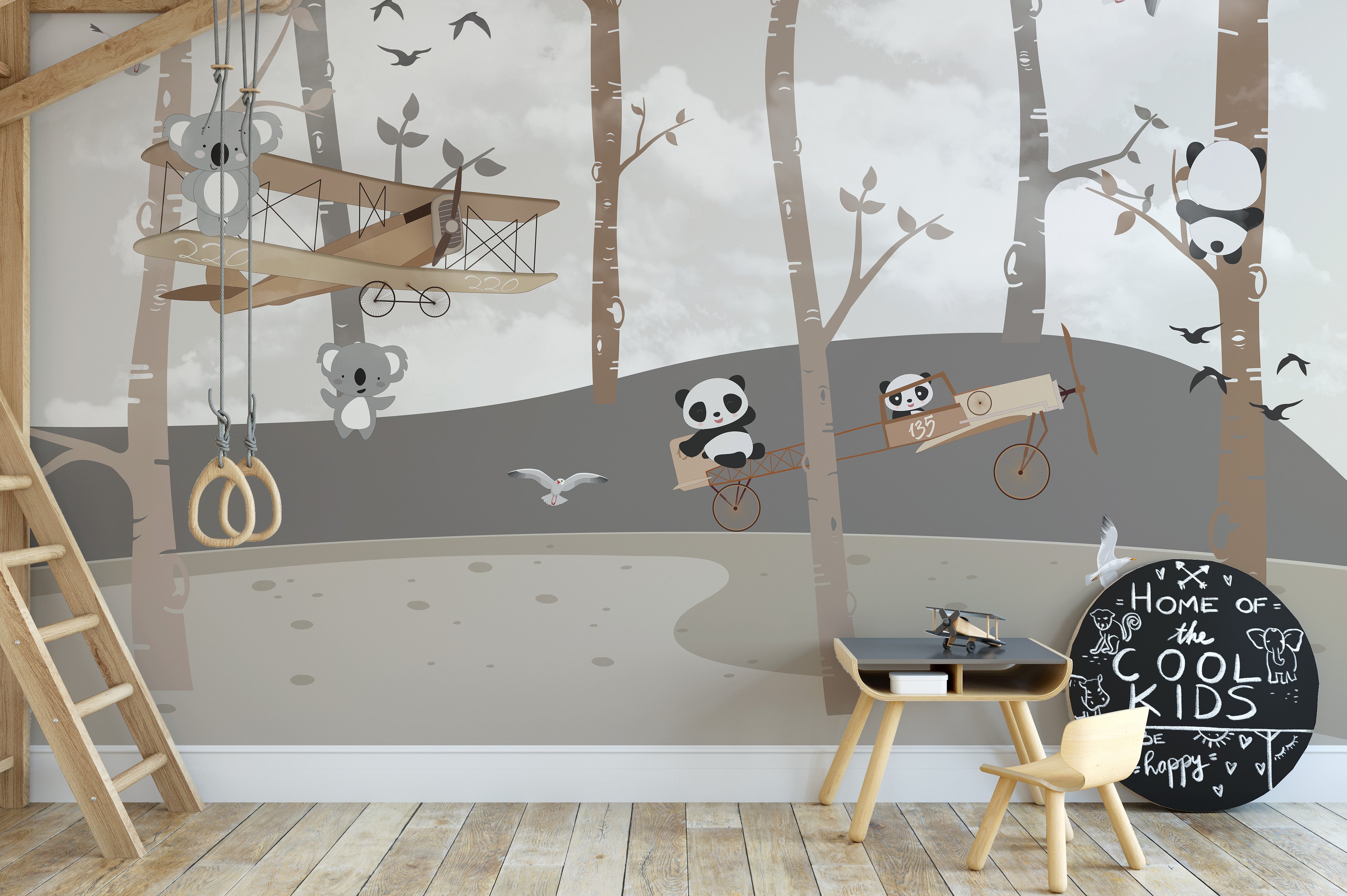 Panda and koala aviators mural inspiring adventure for kids.
