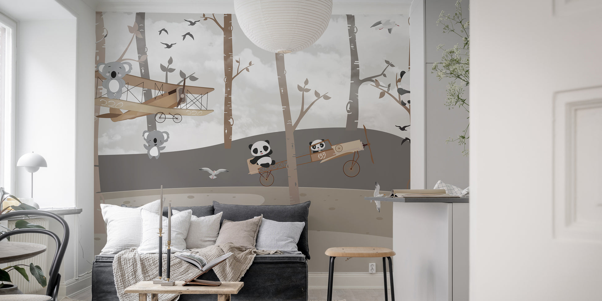 Fun wall mural featuring panda and koala aviator explorers.
