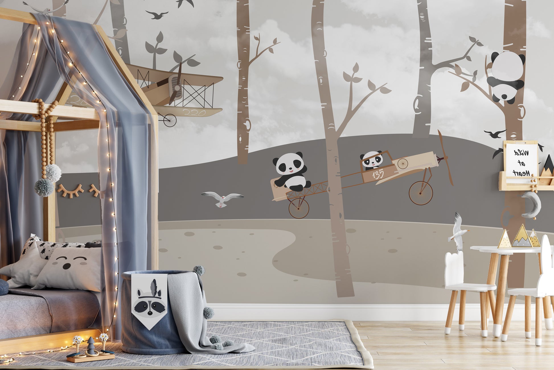 Aviator-themed panda and koala mural for creative interiors.
