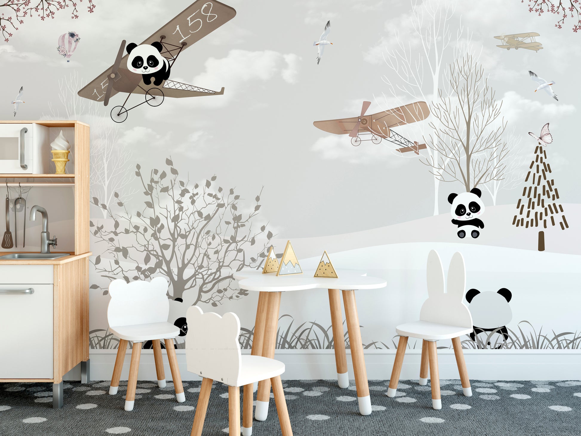 Panda wings of wonder mural set in a snowy, magical landscape.
