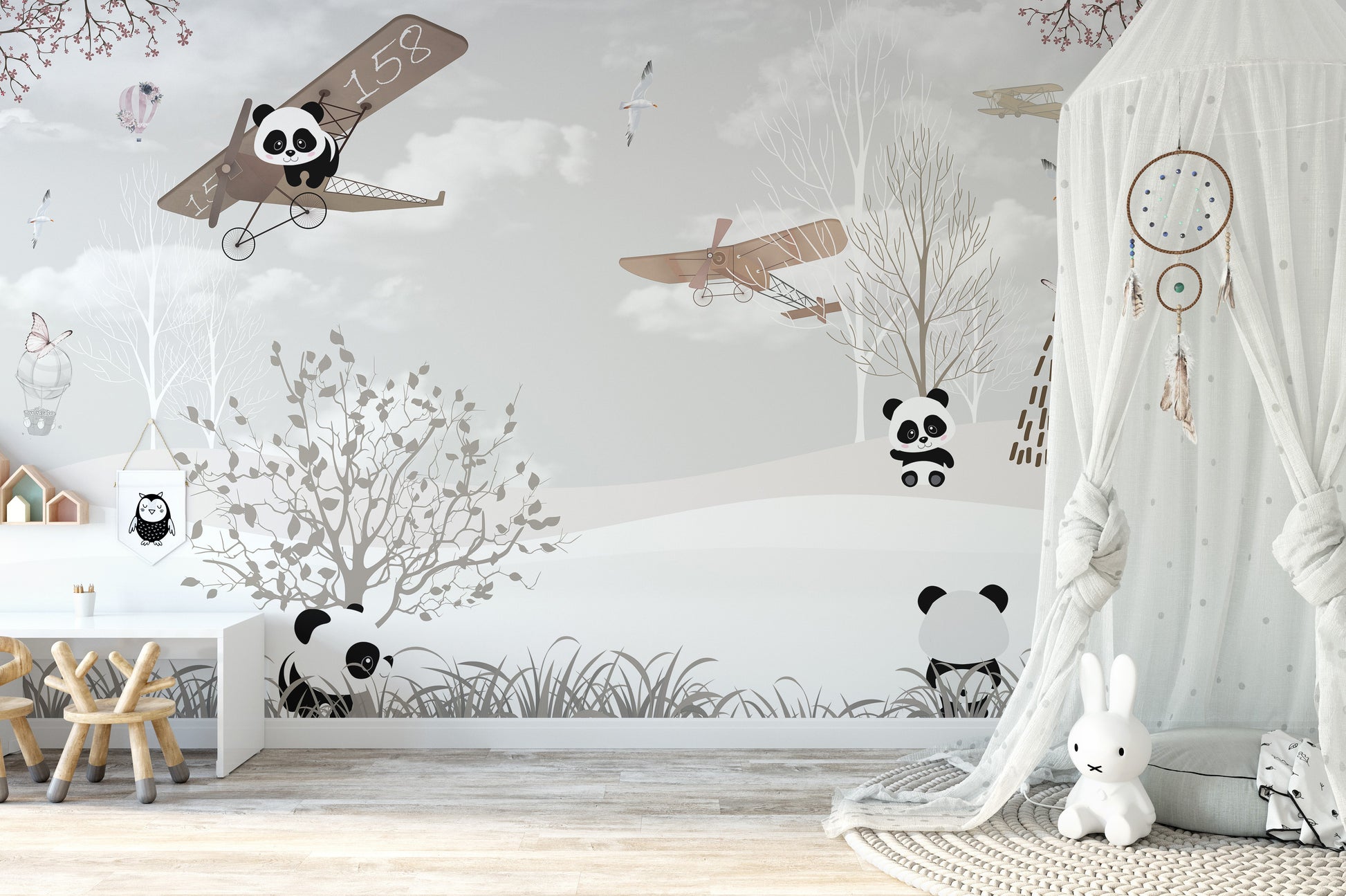 Snowy panda mural with wings for dreamy and imaginative decor.
