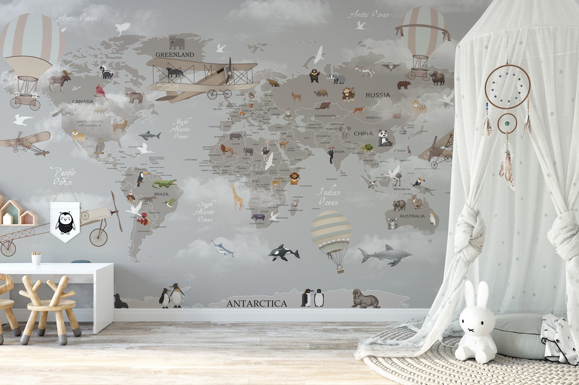 Playful world map mural with aloft animals for kids' interiors.
