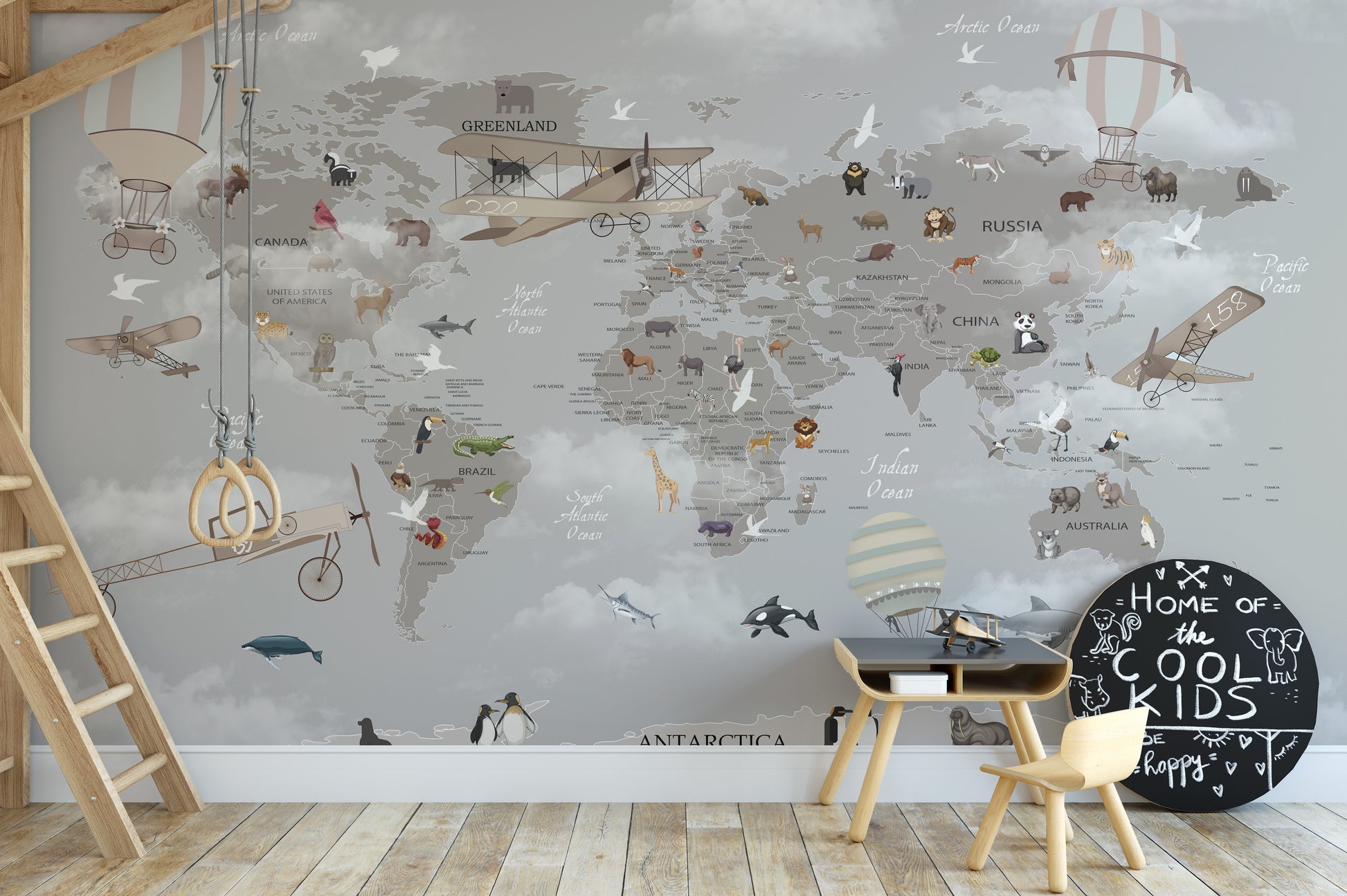 Vibrant mural featuring animals aloft on a world map backdrop.
