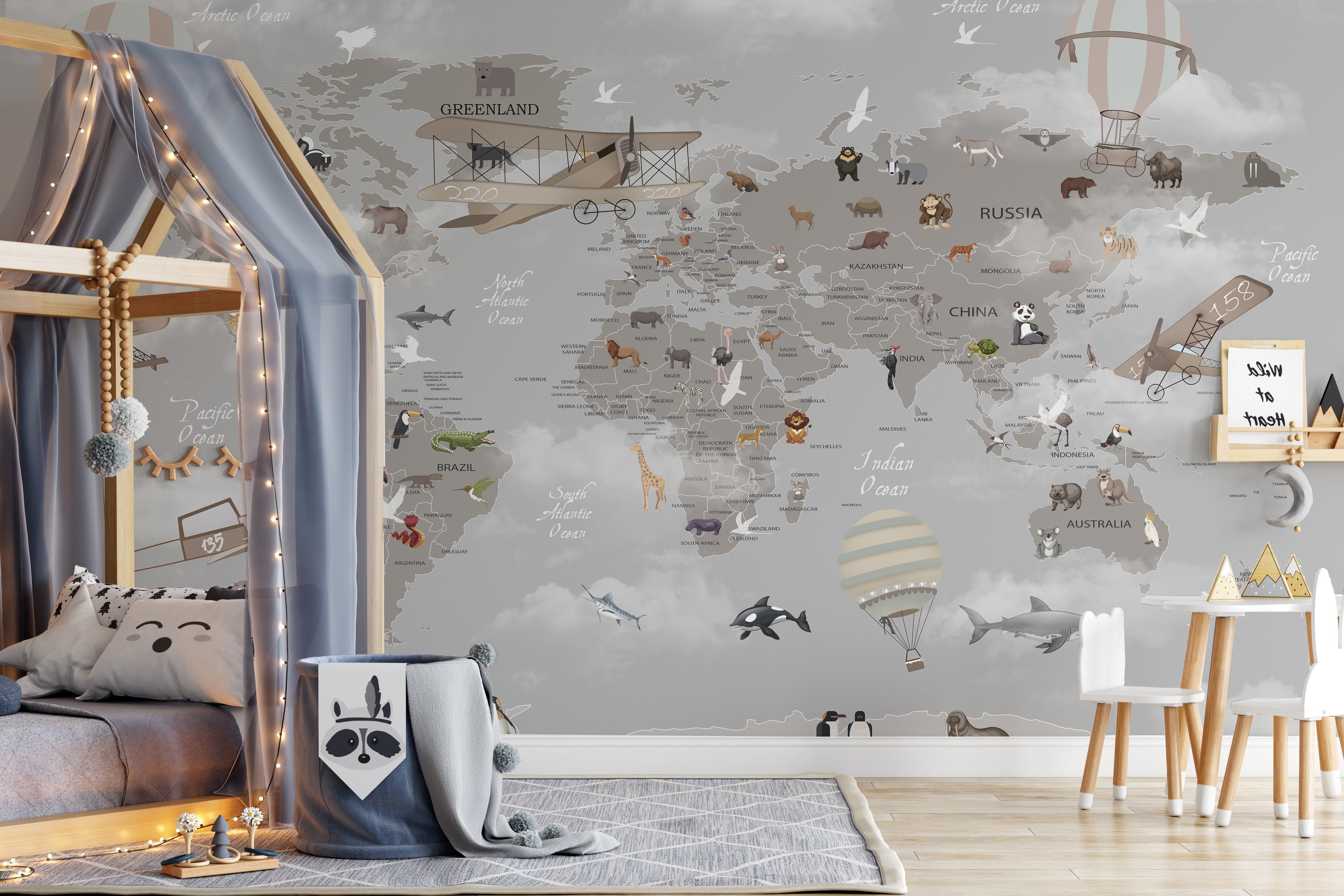 Educational animals aloft map mural for creative wall decor.
