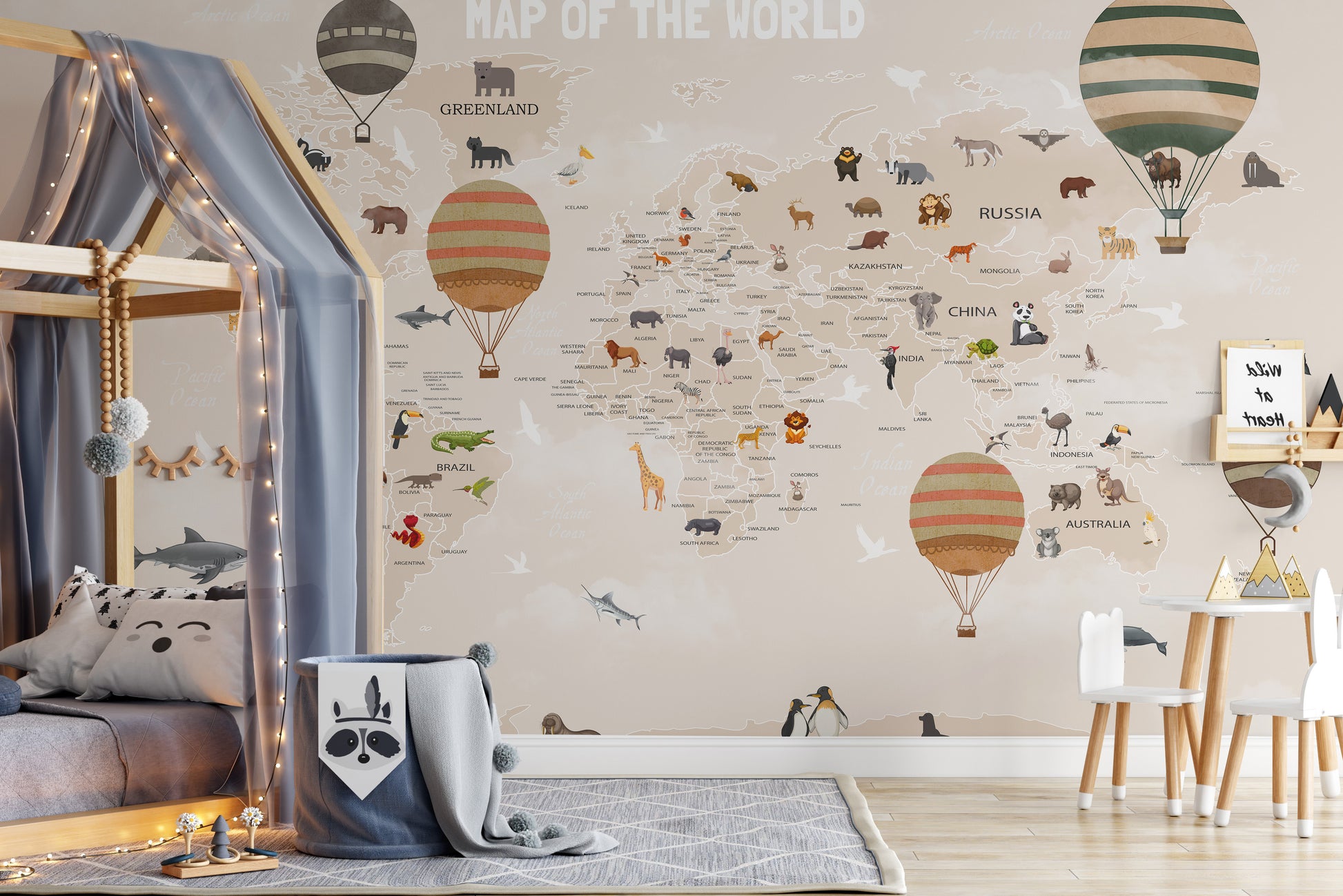 Vibrant mural with adventurous animals on a world map backdrop.
