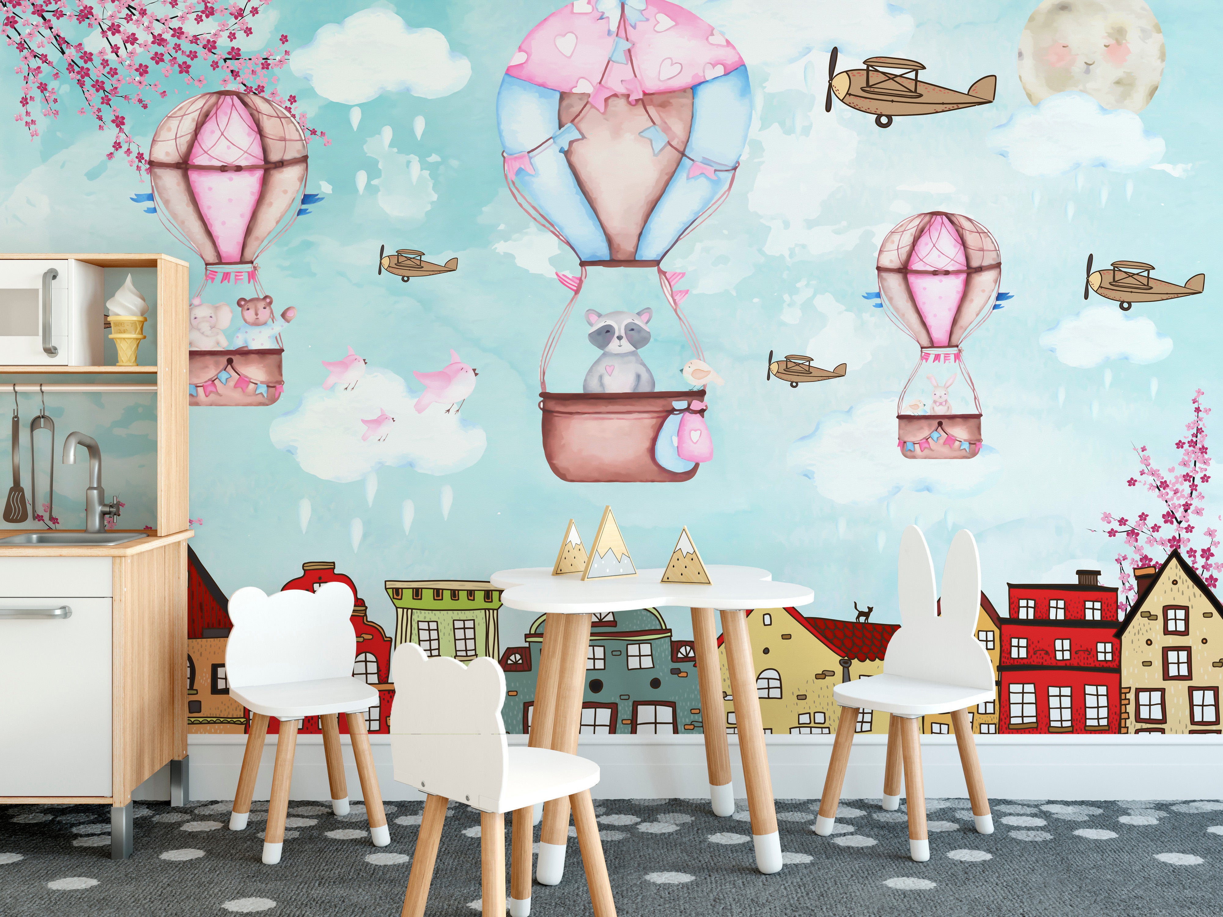 Aerial escapade mural with a cartoon city theme for kids' walls.