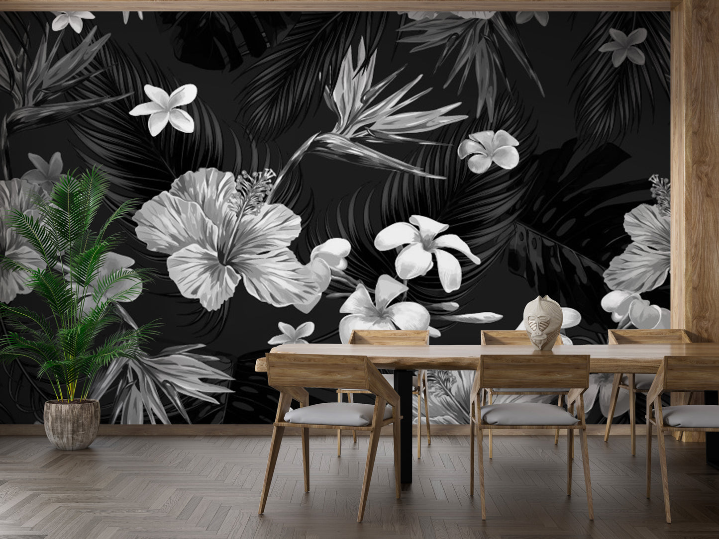 Tropical-themed mural with black and white floral artistry.
