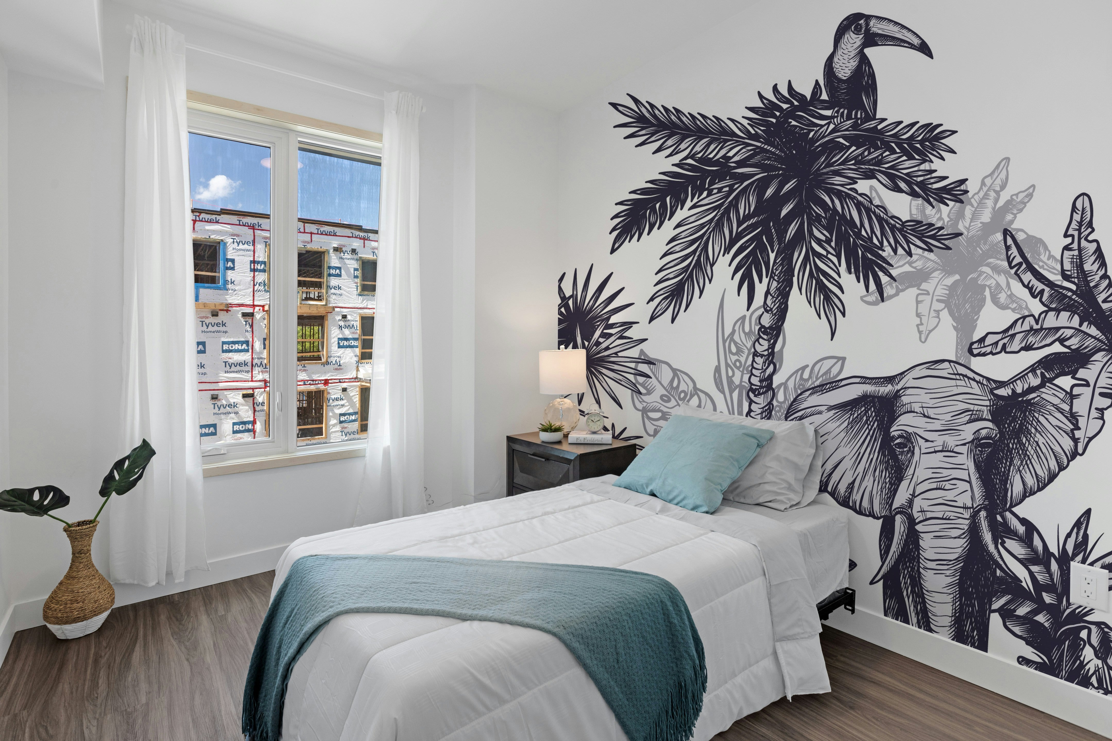 Wildlife mural showcasing a colorful tropical paradise scene.
