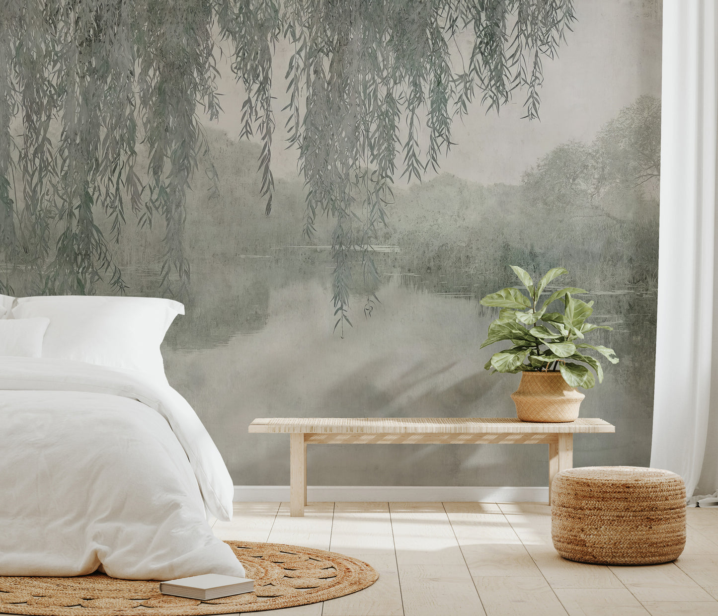 Calm wallpaper scene with willow branches extending over a reflective, foggy lake.