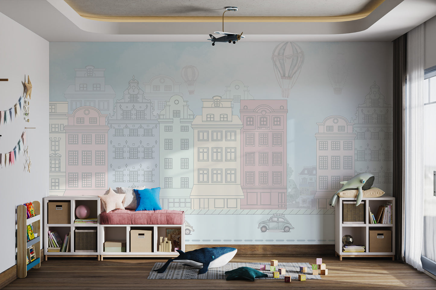 Whimsical mural of antique townhouses in pale pink, cream, and green with hot air balloons.